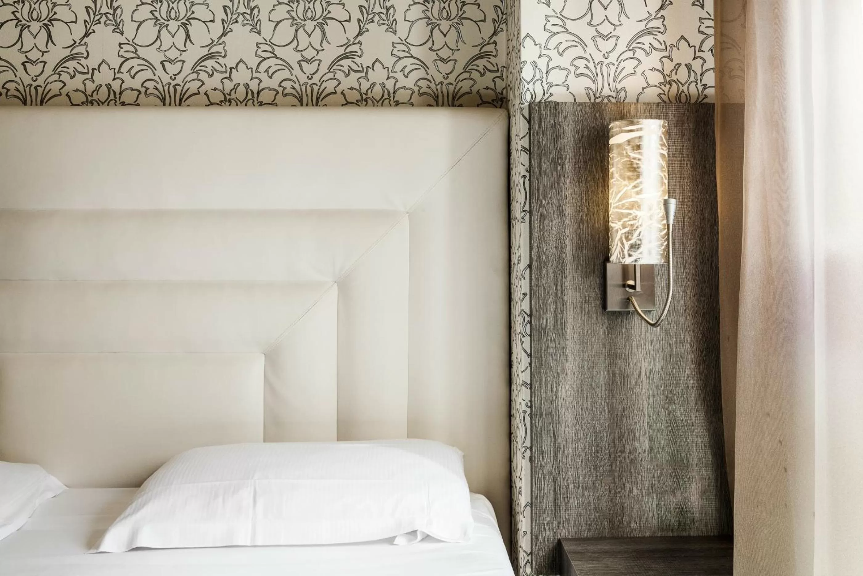 Decorative detail, Bed in Hotel Des Etrangers