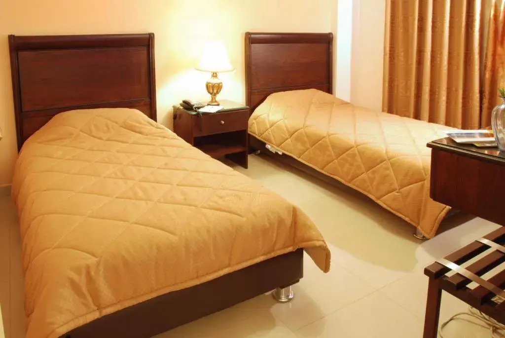 Bed in Jardaneh Hotel