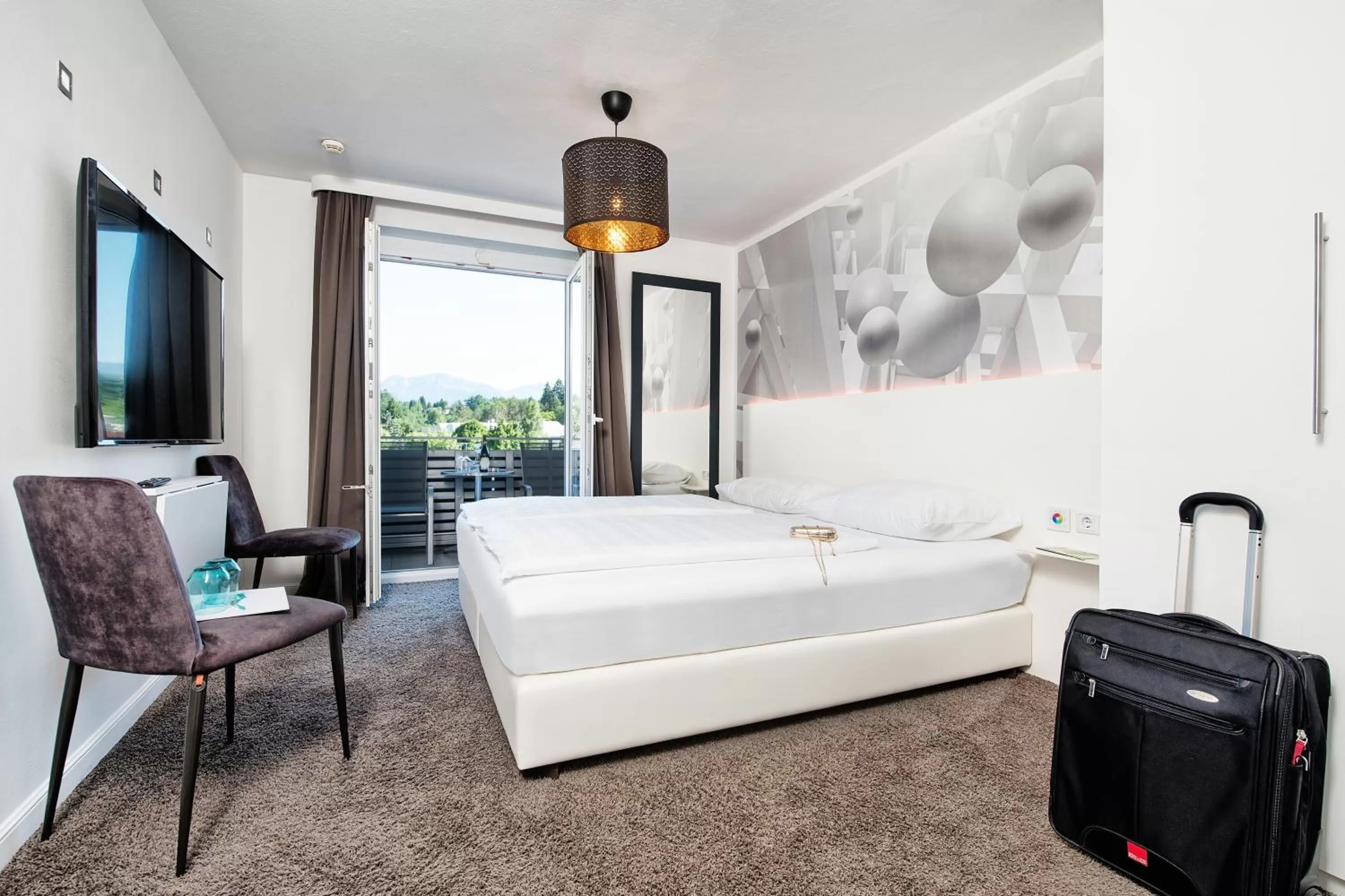 Photo of the whole room, Bed in Hotel Velden - 24 Checkin Zimmer im Zentrum