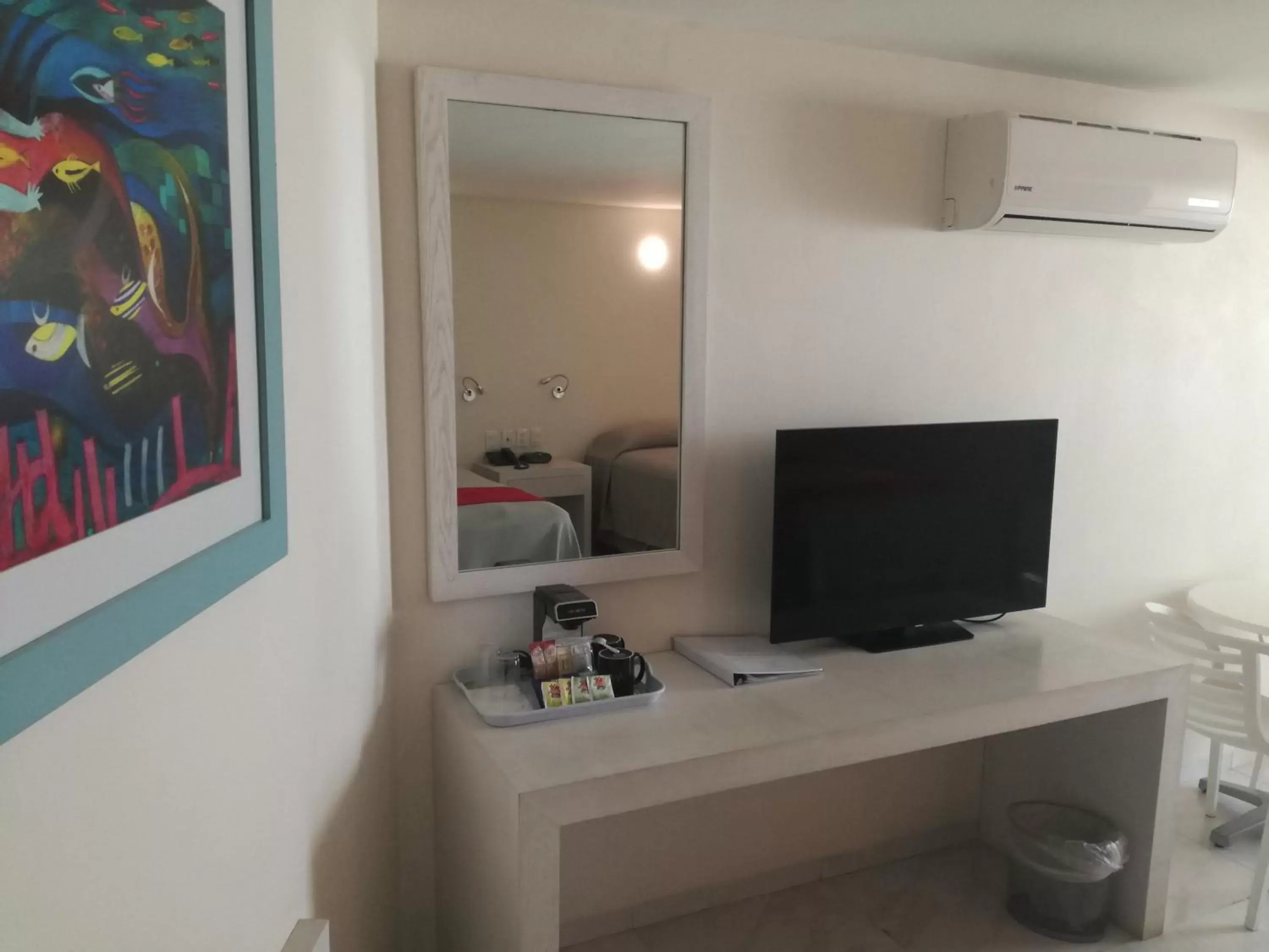 TV and multimedia, TV/Entertainment Center in We Hotel Acapulco
