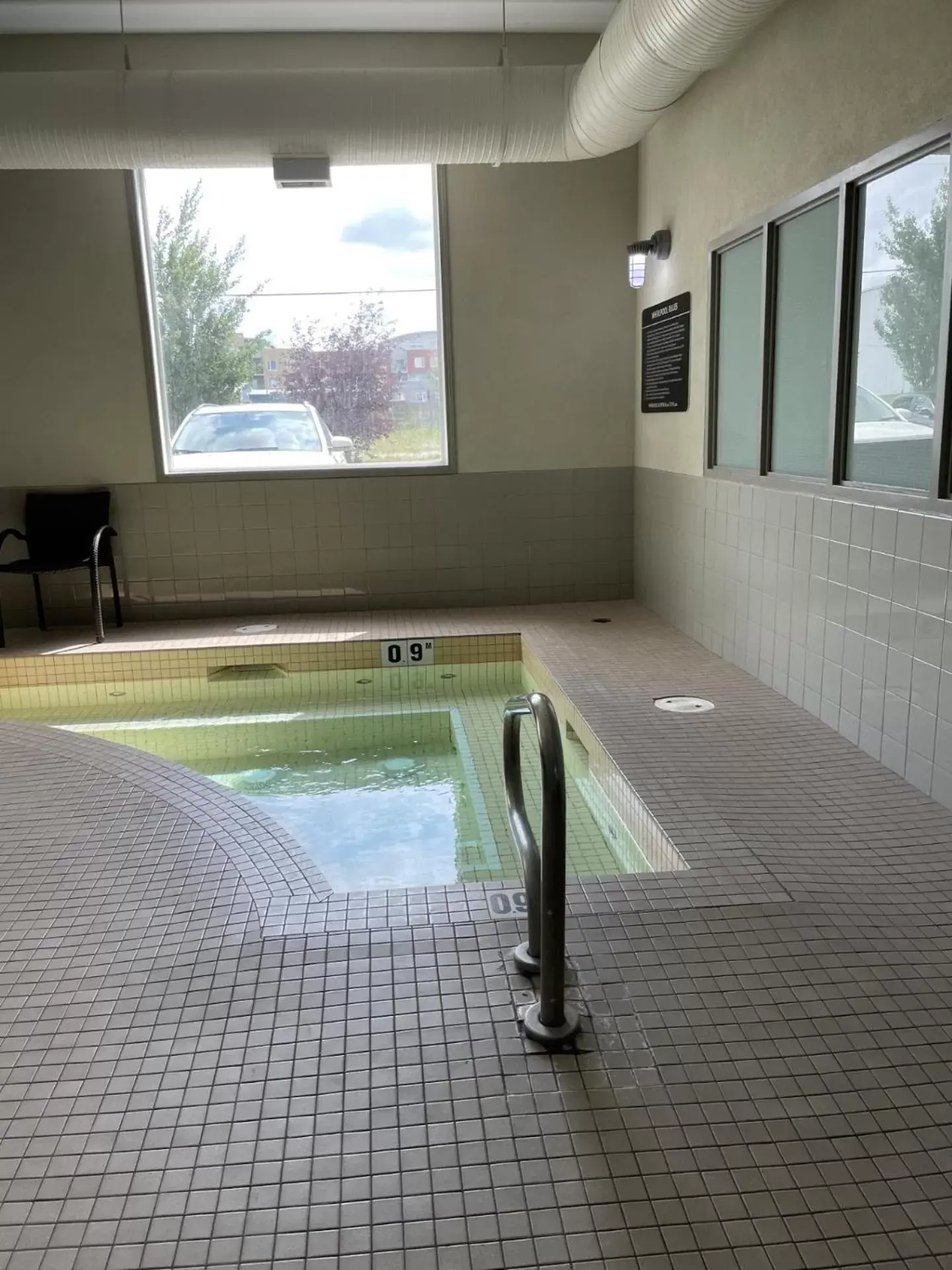 Hot Tub, Swimming Pool in Ramada by Wyndham Airdrie Hotel & Suites