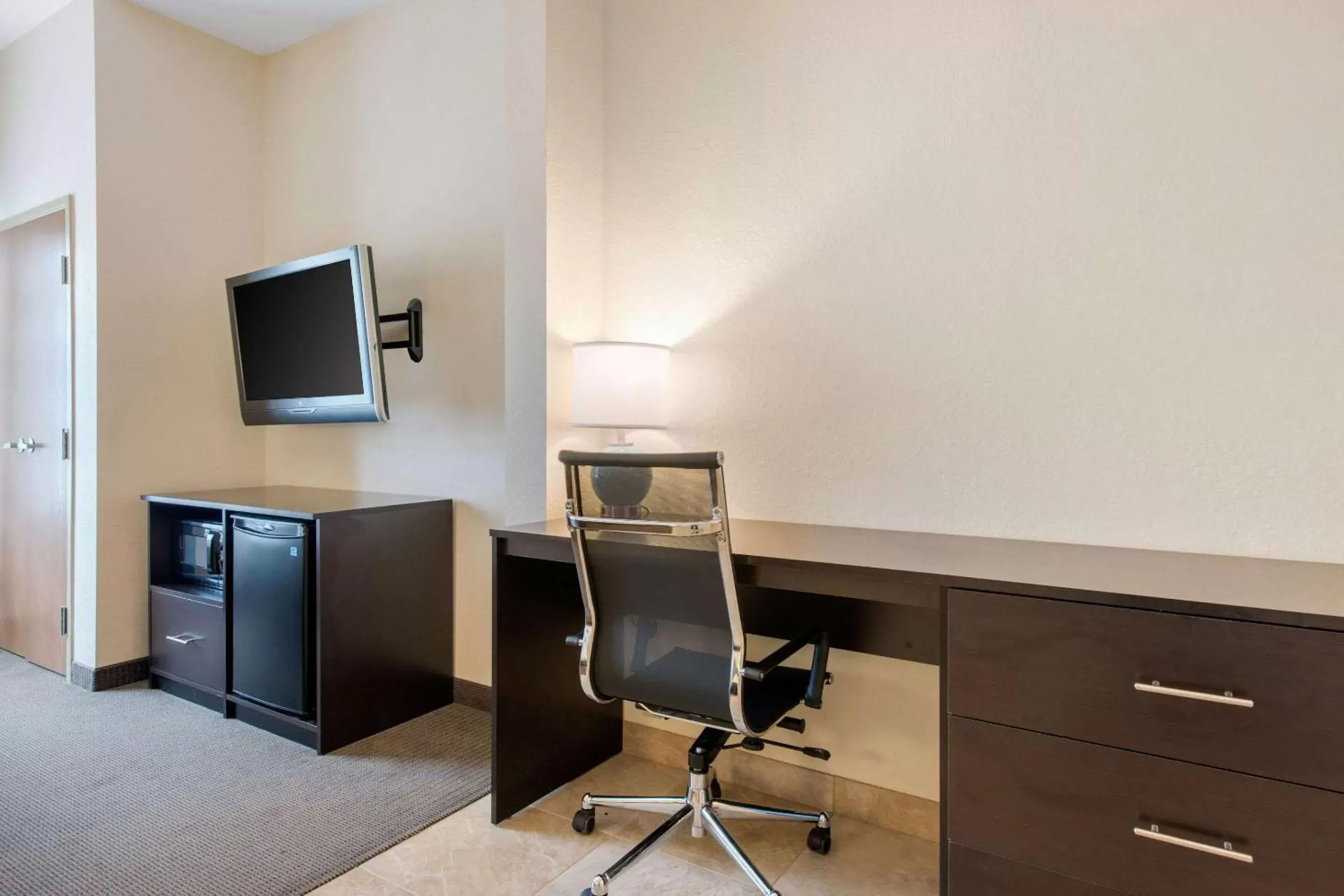 Photo of the whole room, TV/Entertainment Center in Sleep Inn & Suites Port Charlotte-Punta Gorda