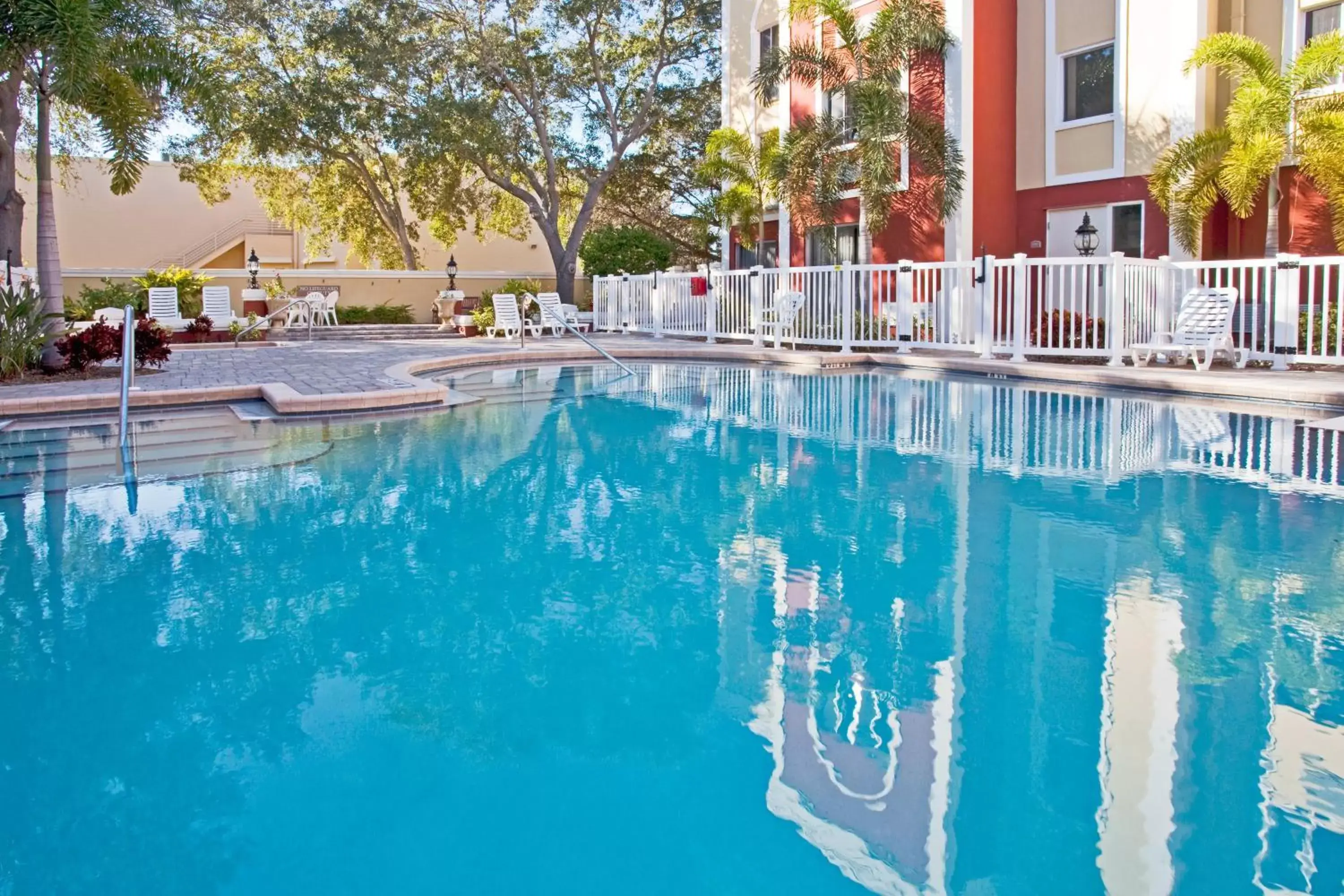 Swimming Pool in Holiday Inn Express Hotel & Suites Bradenton West, an IHG Hotel