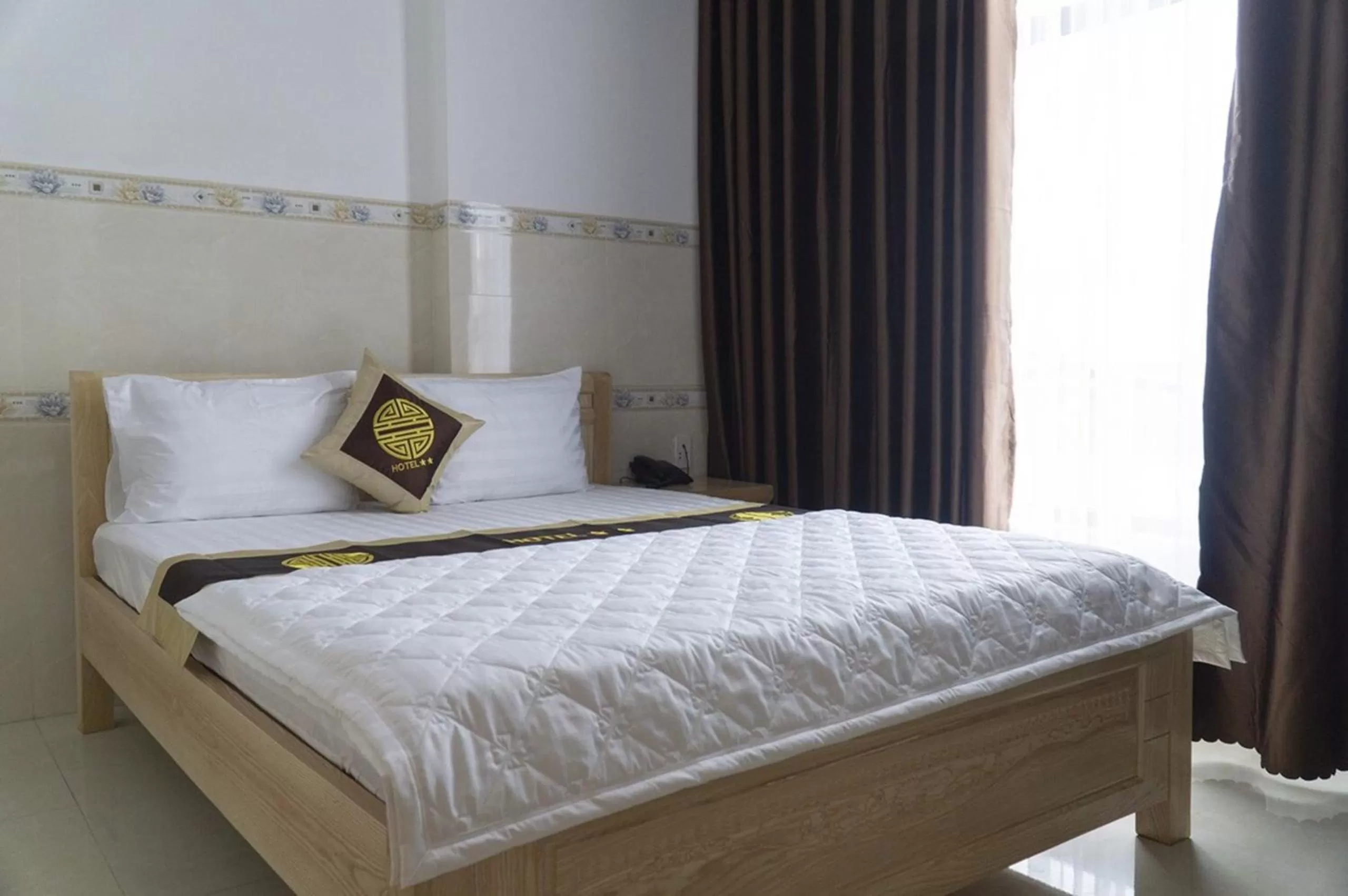 Bedroom, Bed in Dai An Binh Tan Hotel