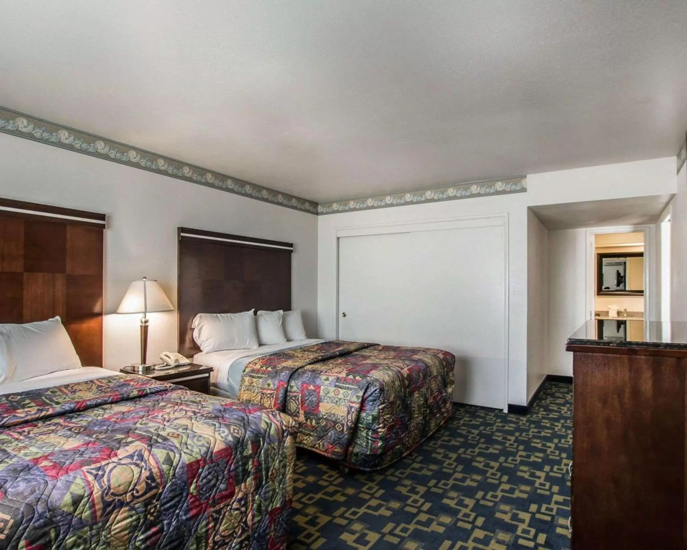 Photo of the whole room, Bed in Rodeway Inn Oceanside Marina