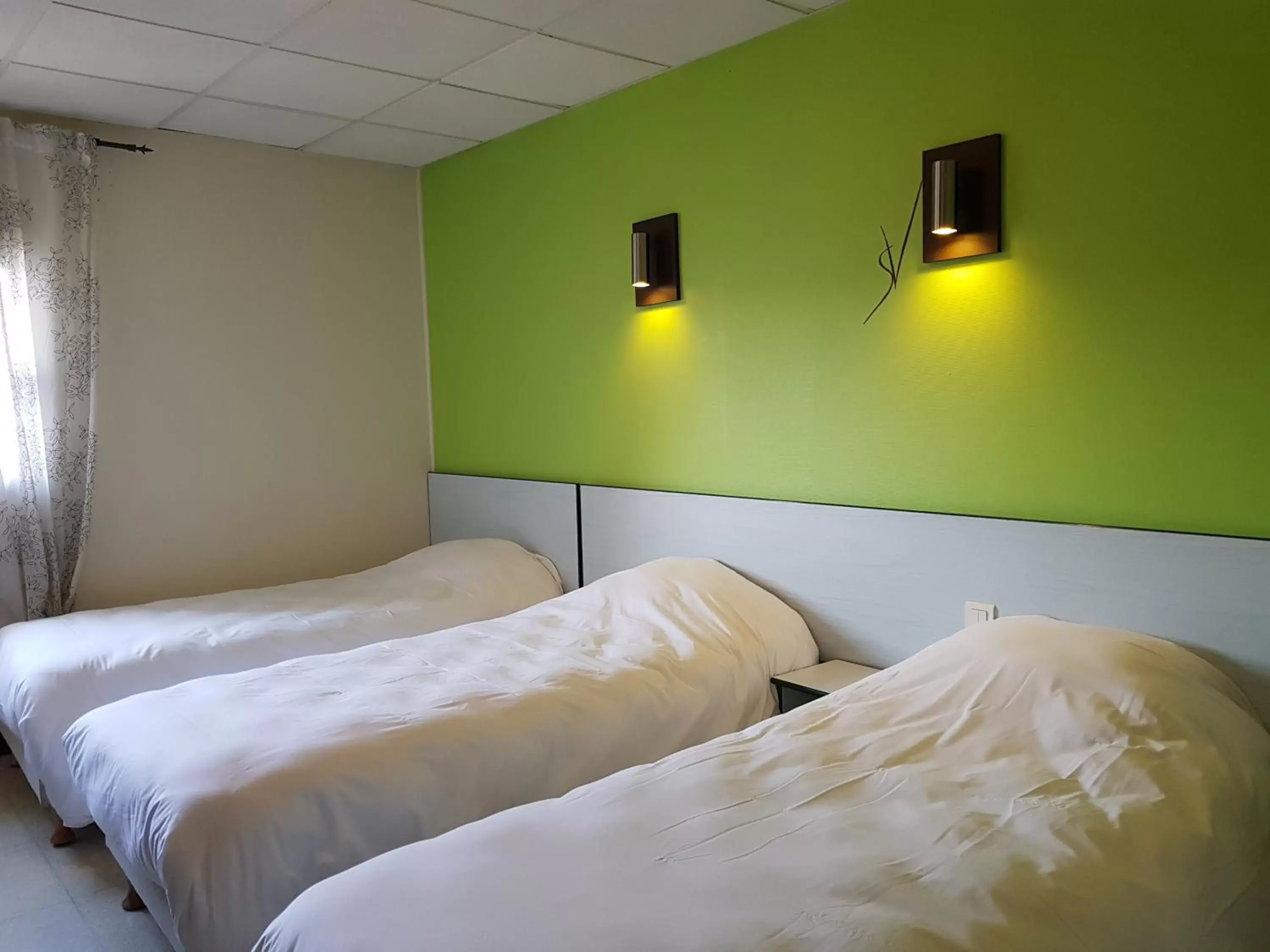 Bedroom, Bed in Hotel Le Saint Vincent Lyon Sud Bedroom, Bed in Hotel Le Saint Vincent Lyon Sud