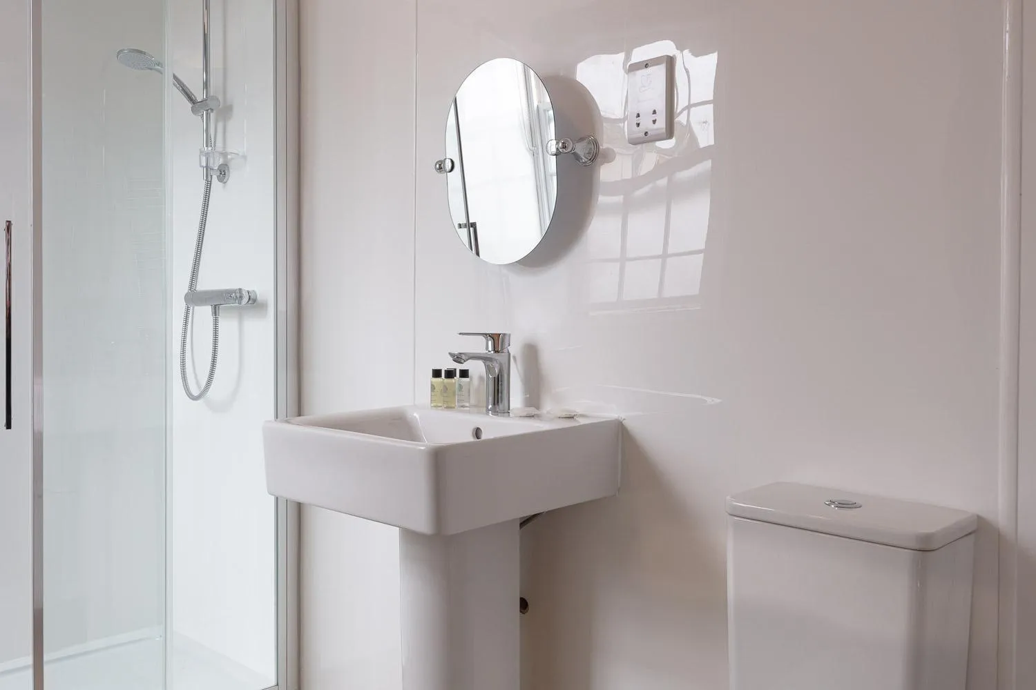 Bathroom in The New Inn by Roomsbooked