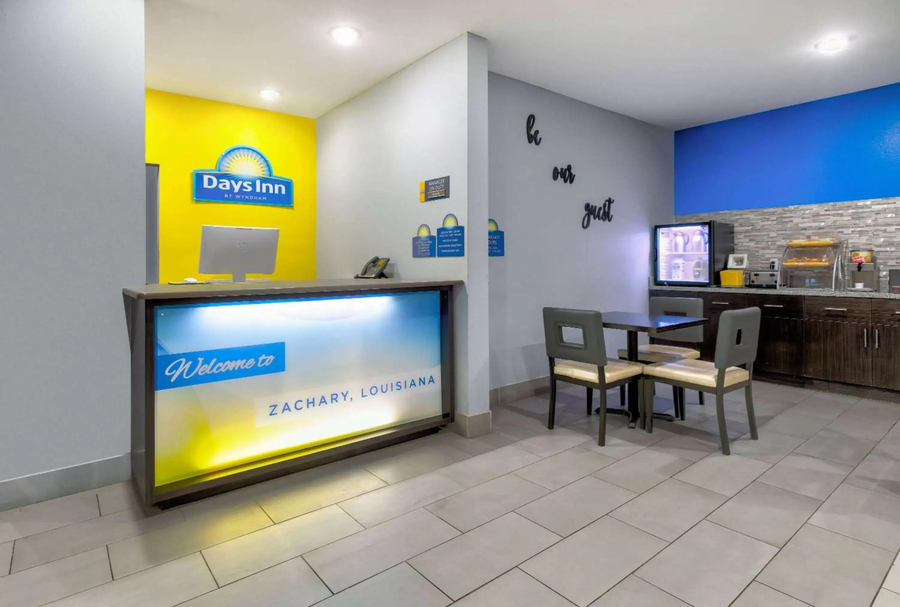 Lobby or reception, TV/Entertainment Center in Days Inn by Wyndham Zachary LA