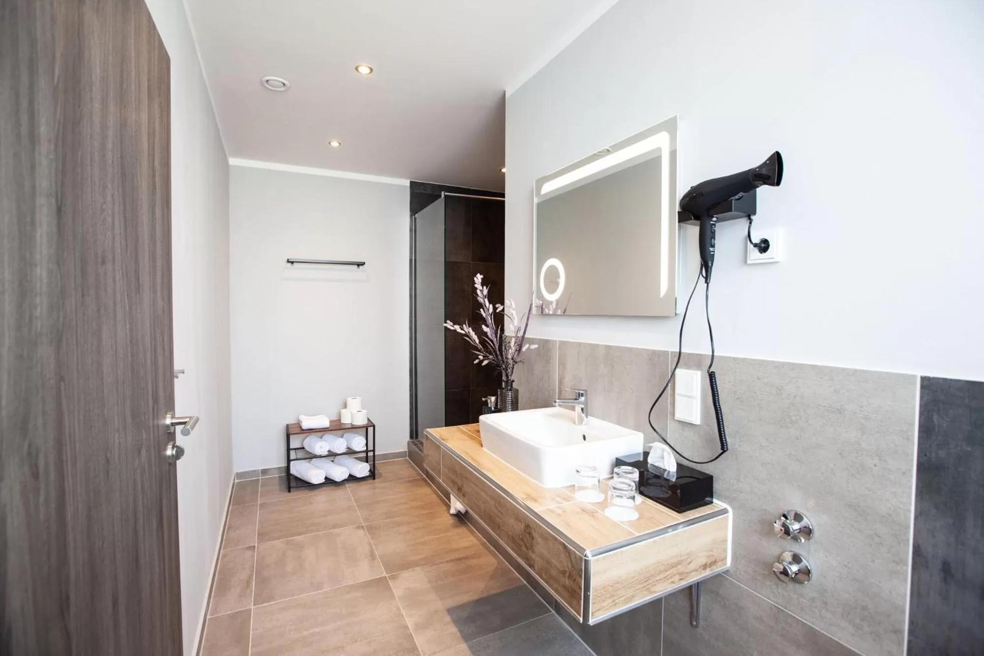 Bathroom in DORMERO Hotel Bremen