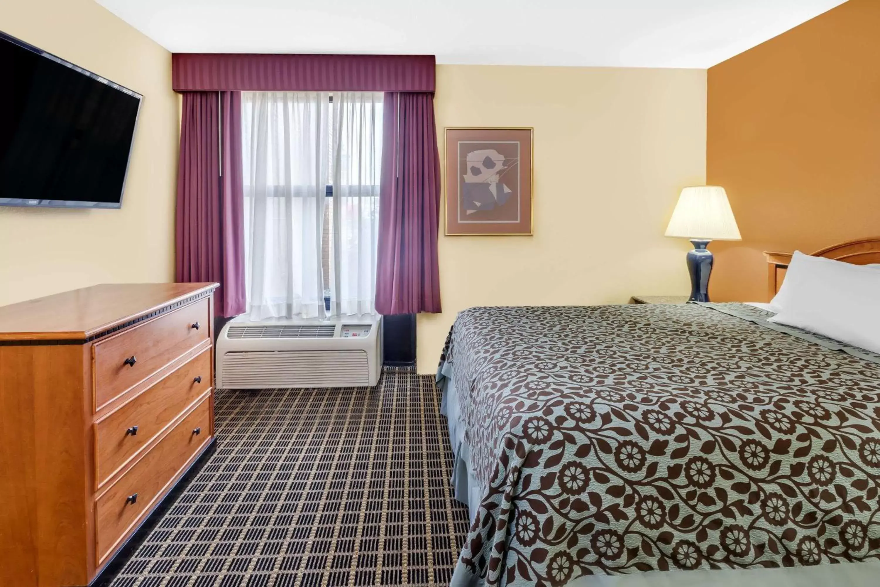 Photo of the whole room, Bed in Days Inn & Suites by Wyndham Kalamazoo