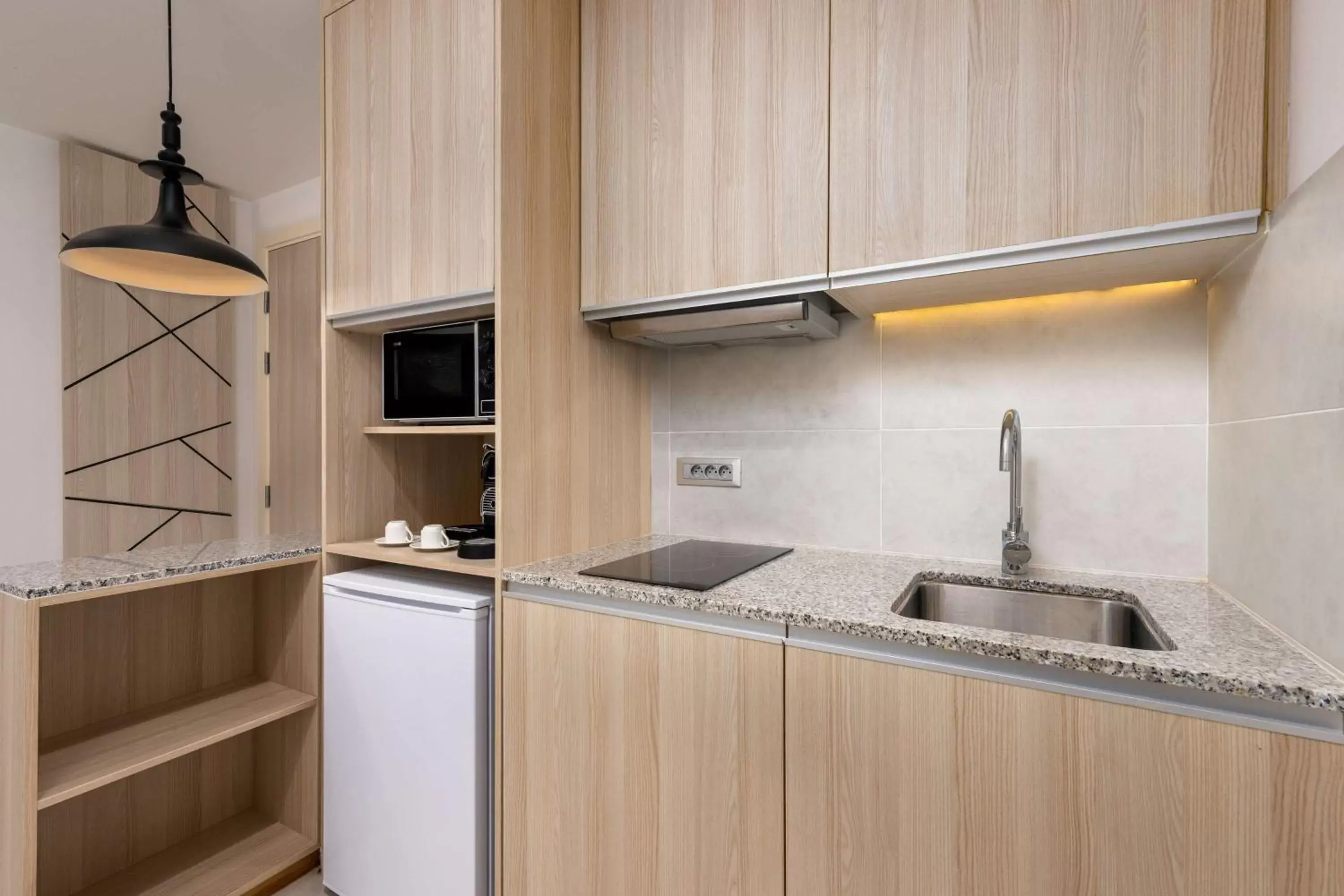 Bedroom, Kitchen/Kitchenette in Radisson Blu Residences, Saidia
