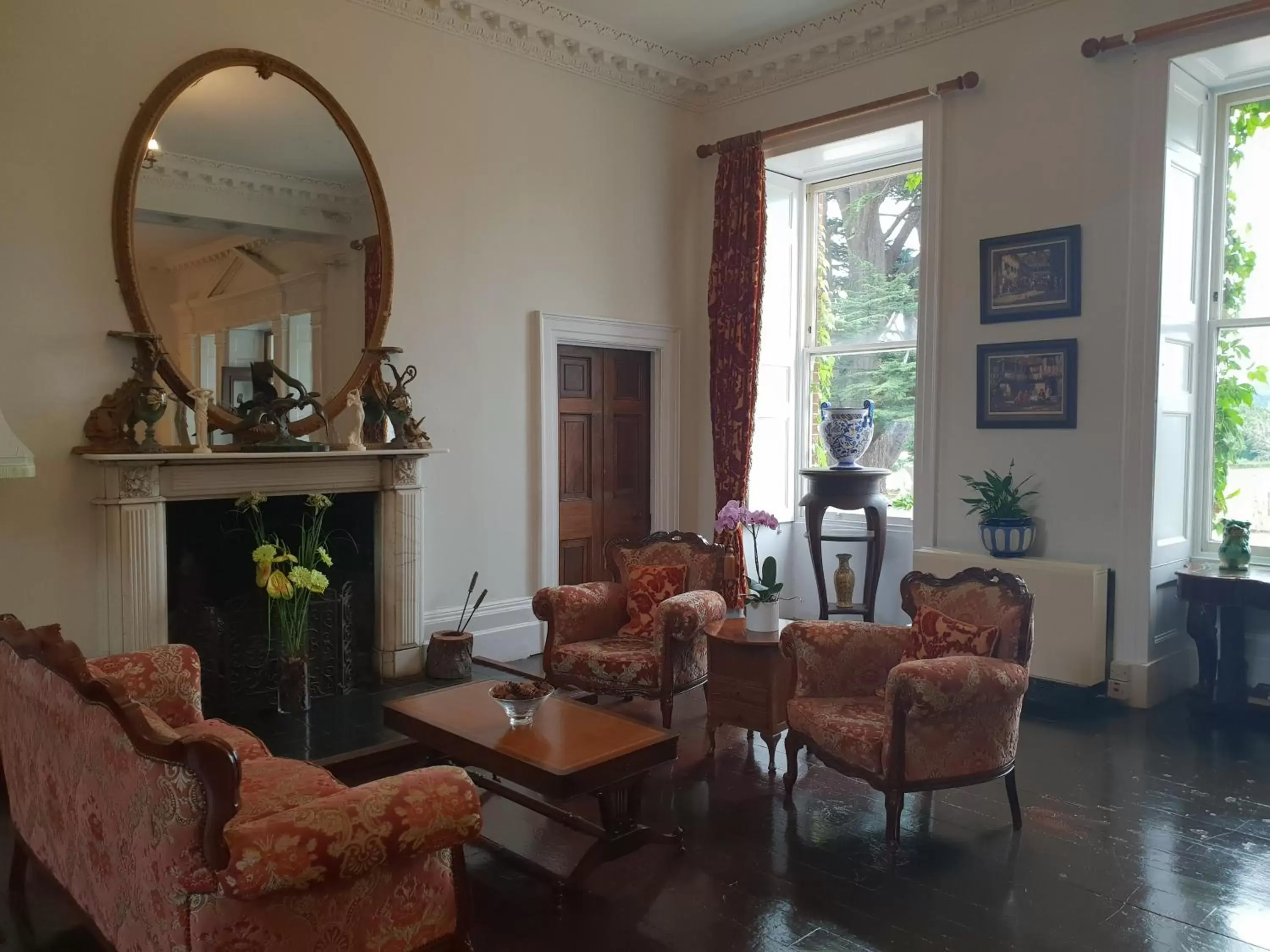 Communal lounge/ TV room, Seating Area in Longworth Hall Hotel