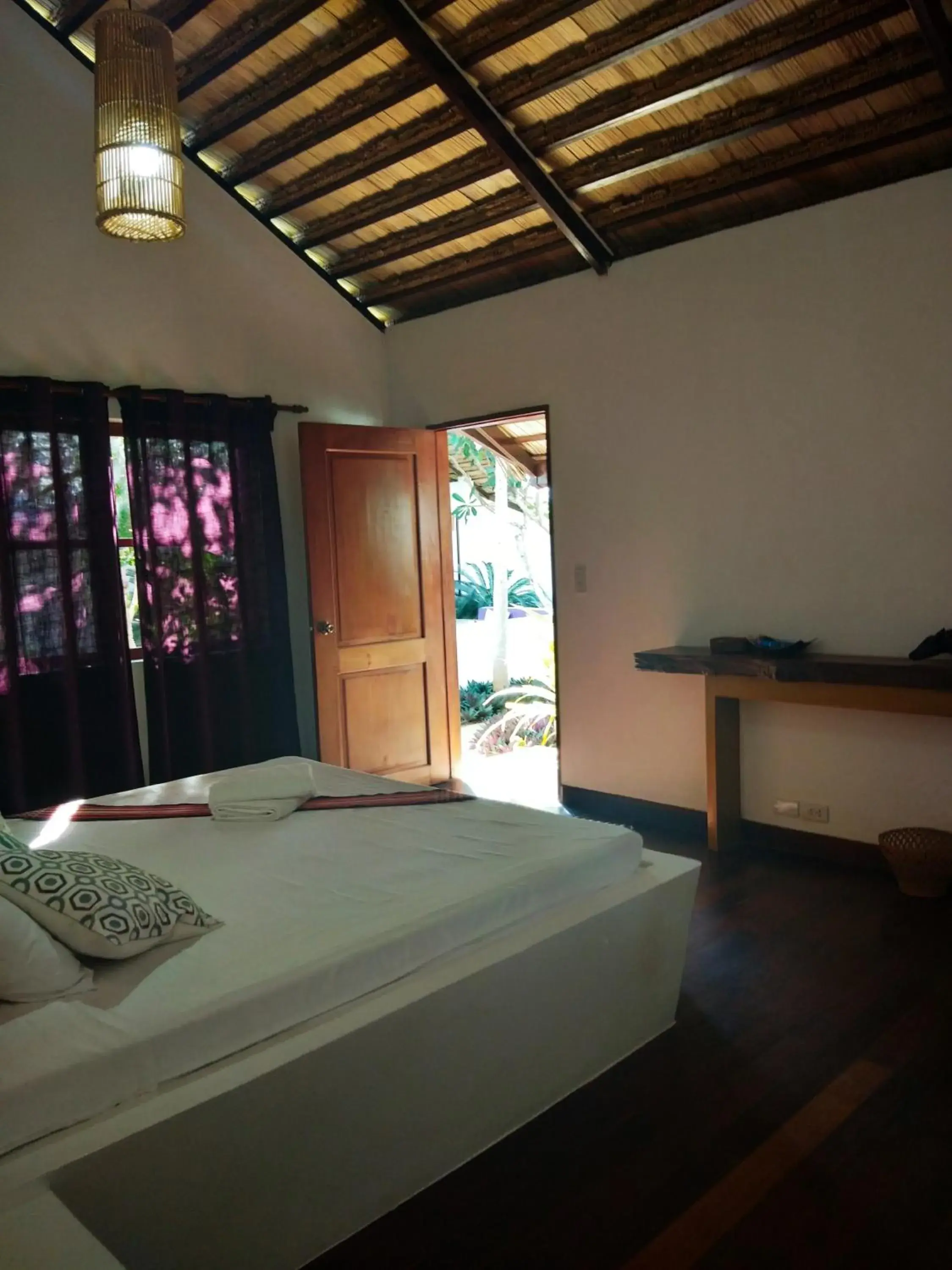 Photo of the whole room, Bed in Villa Kalachuchi V.K