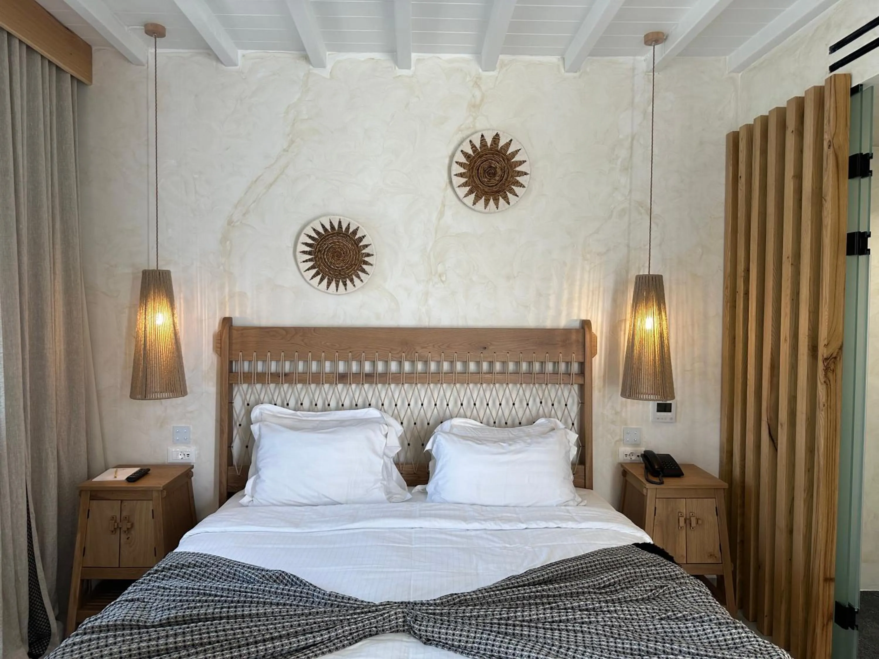 Bed in Panormos Village Hotel