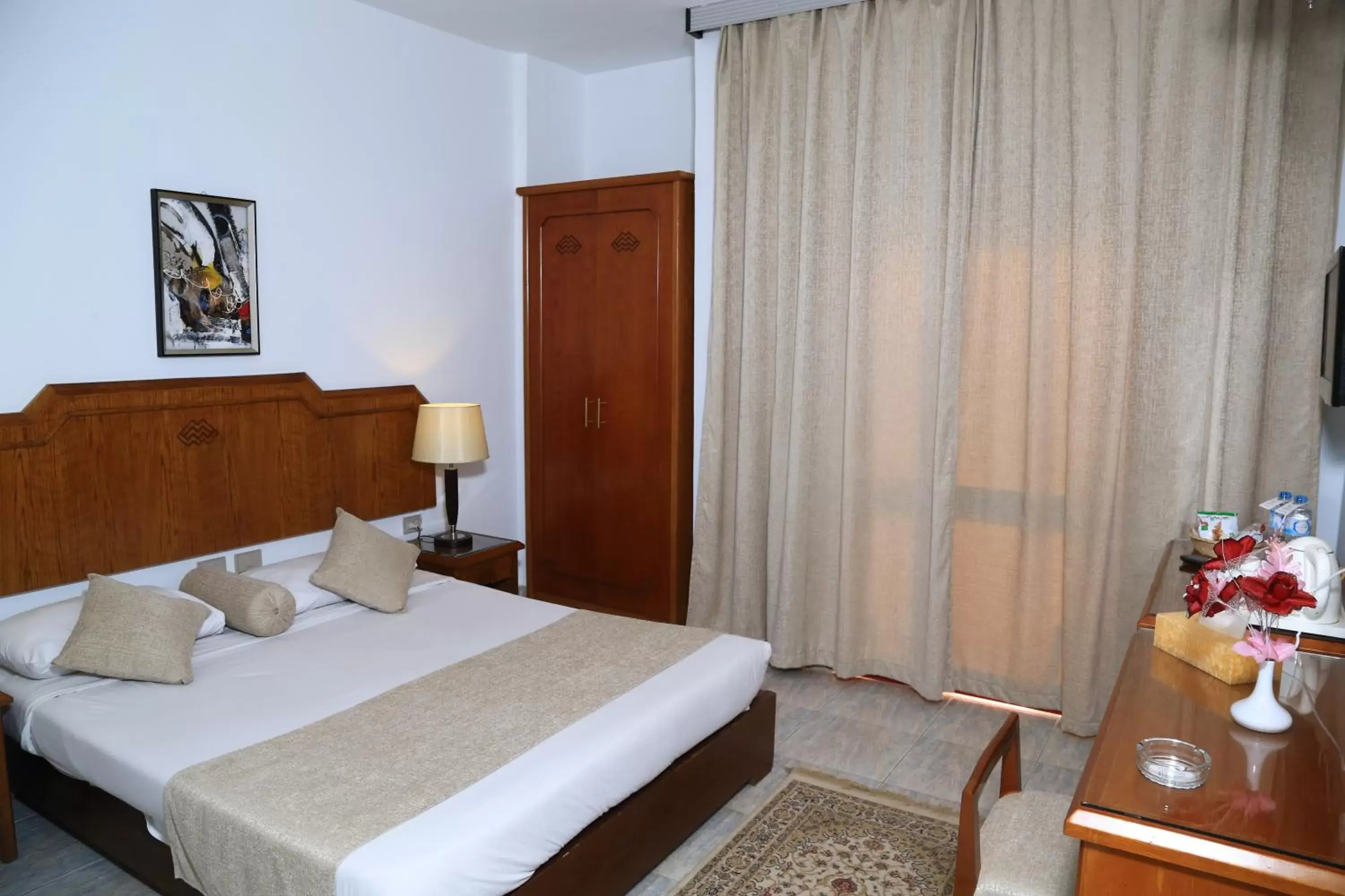 Bed in MinaMark Beach Resort for Families and Couples Only