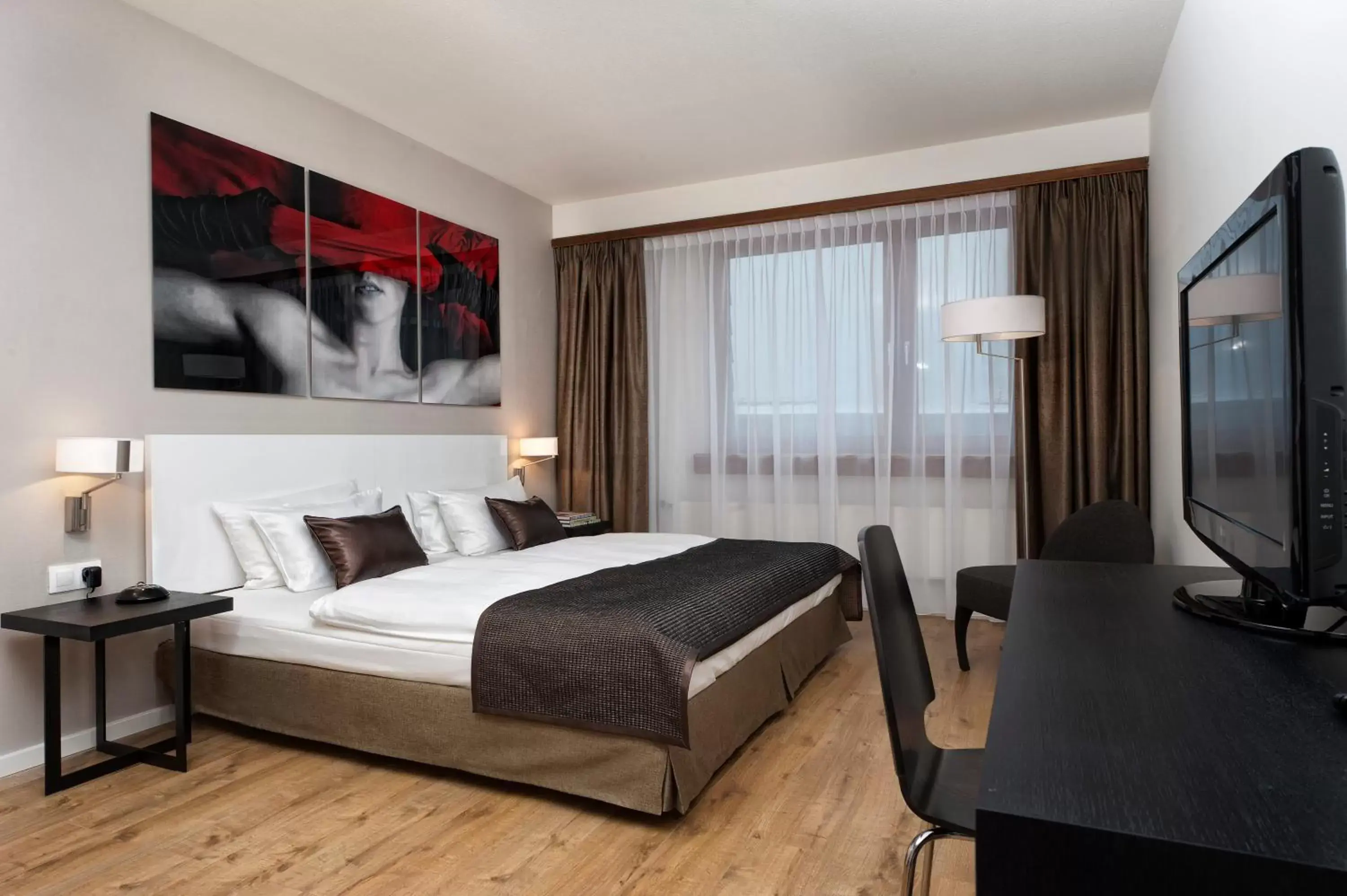 Photo of the whole room, Bed in Wyndham Stuttgart Airport Messe