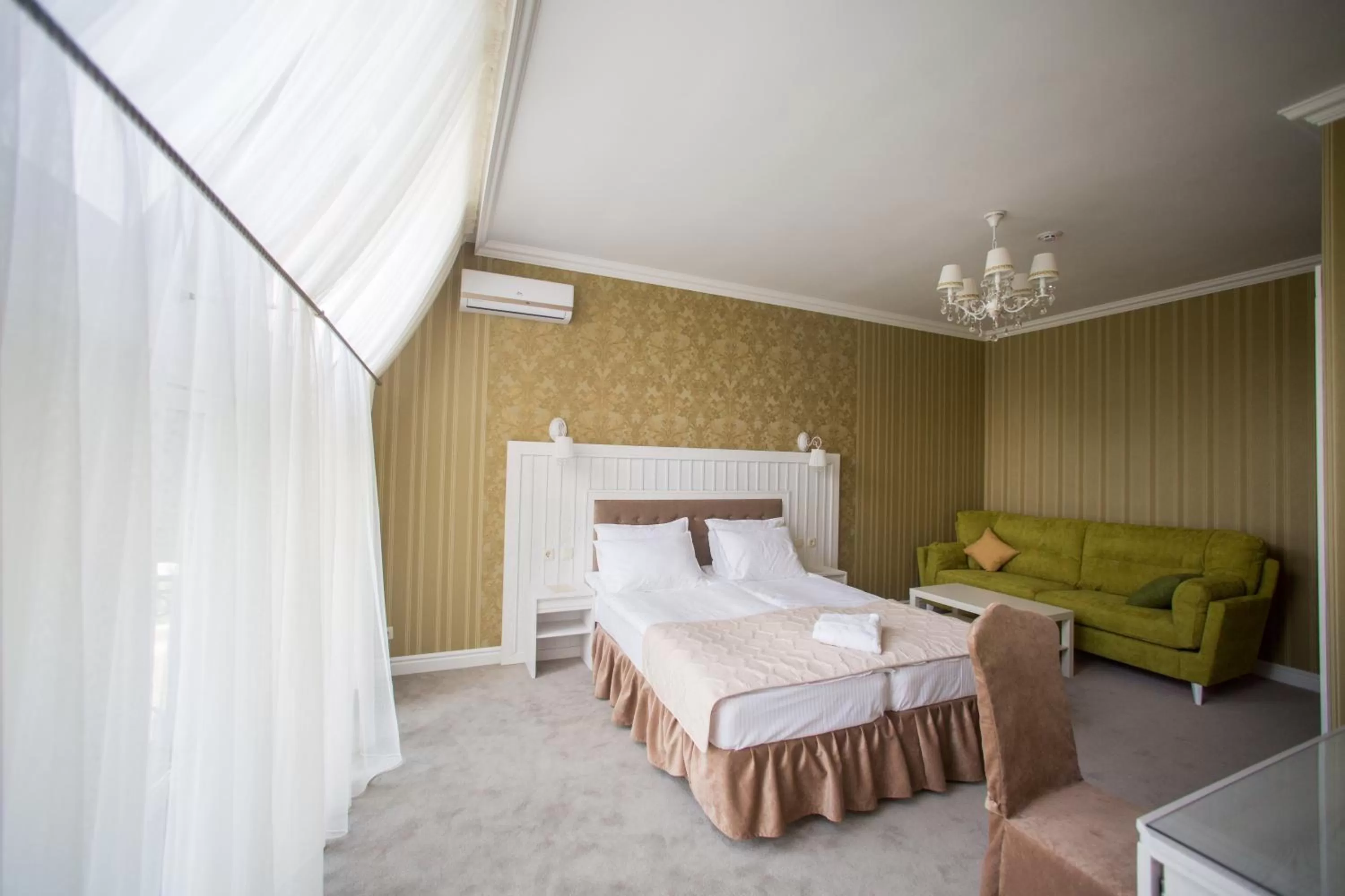 Bed in Boutique Hotel Deluxe