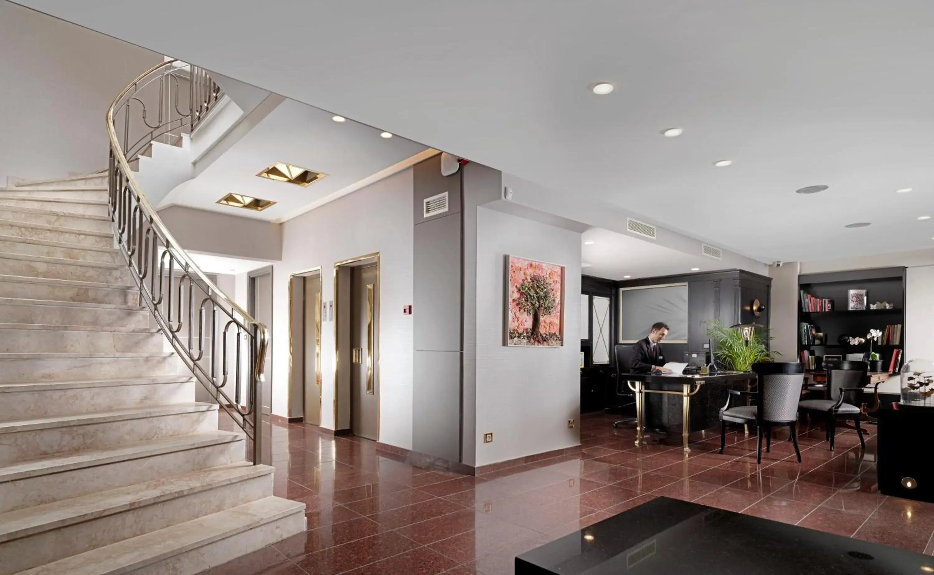 Lobby or reception in Holiday Suites Lobby or reception in Holiday Suites