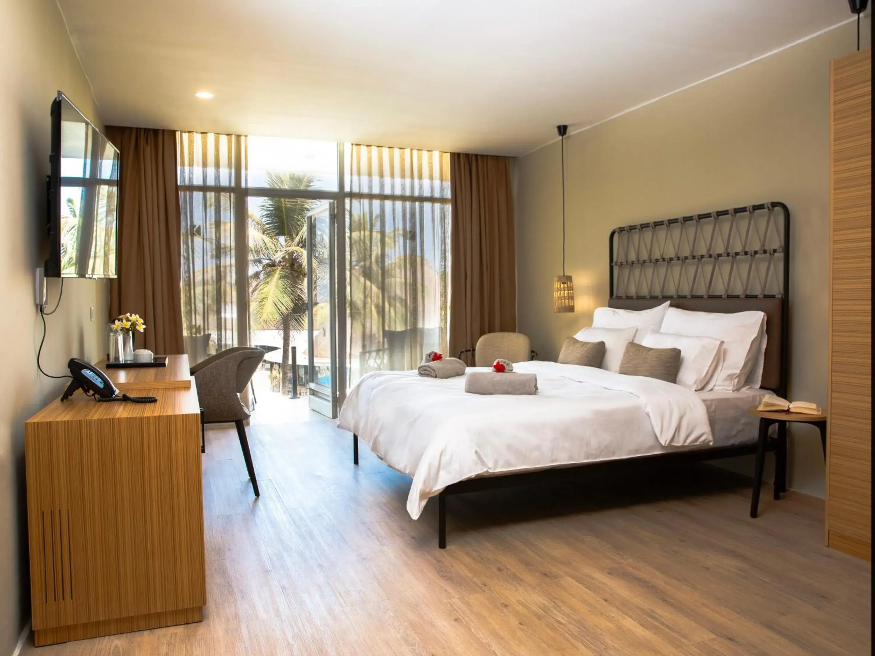 Bedroom in KOMBO BEACH HOTEL