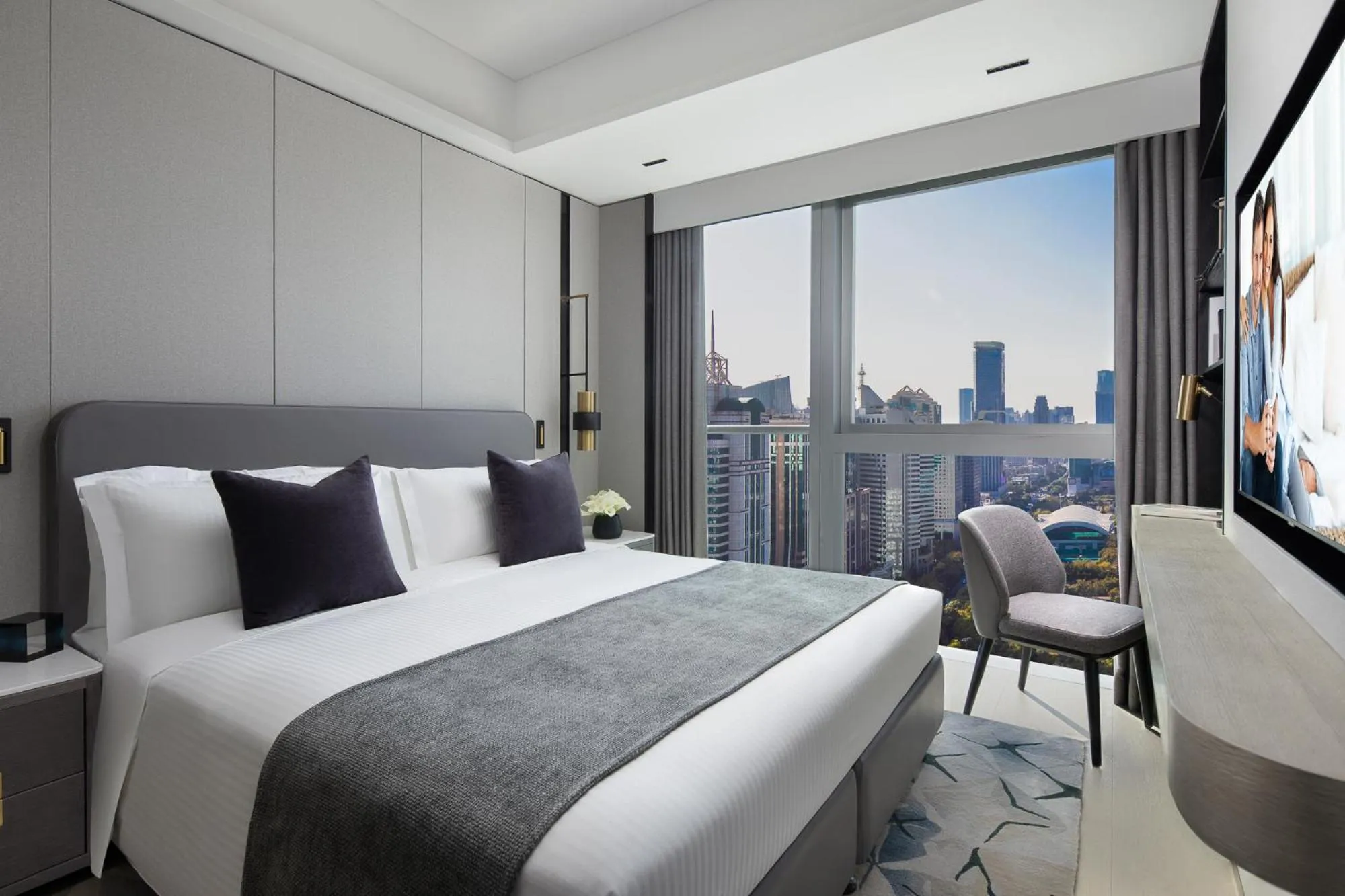 Photo of the whole room, Bed in Ascott ICC Guangzhou