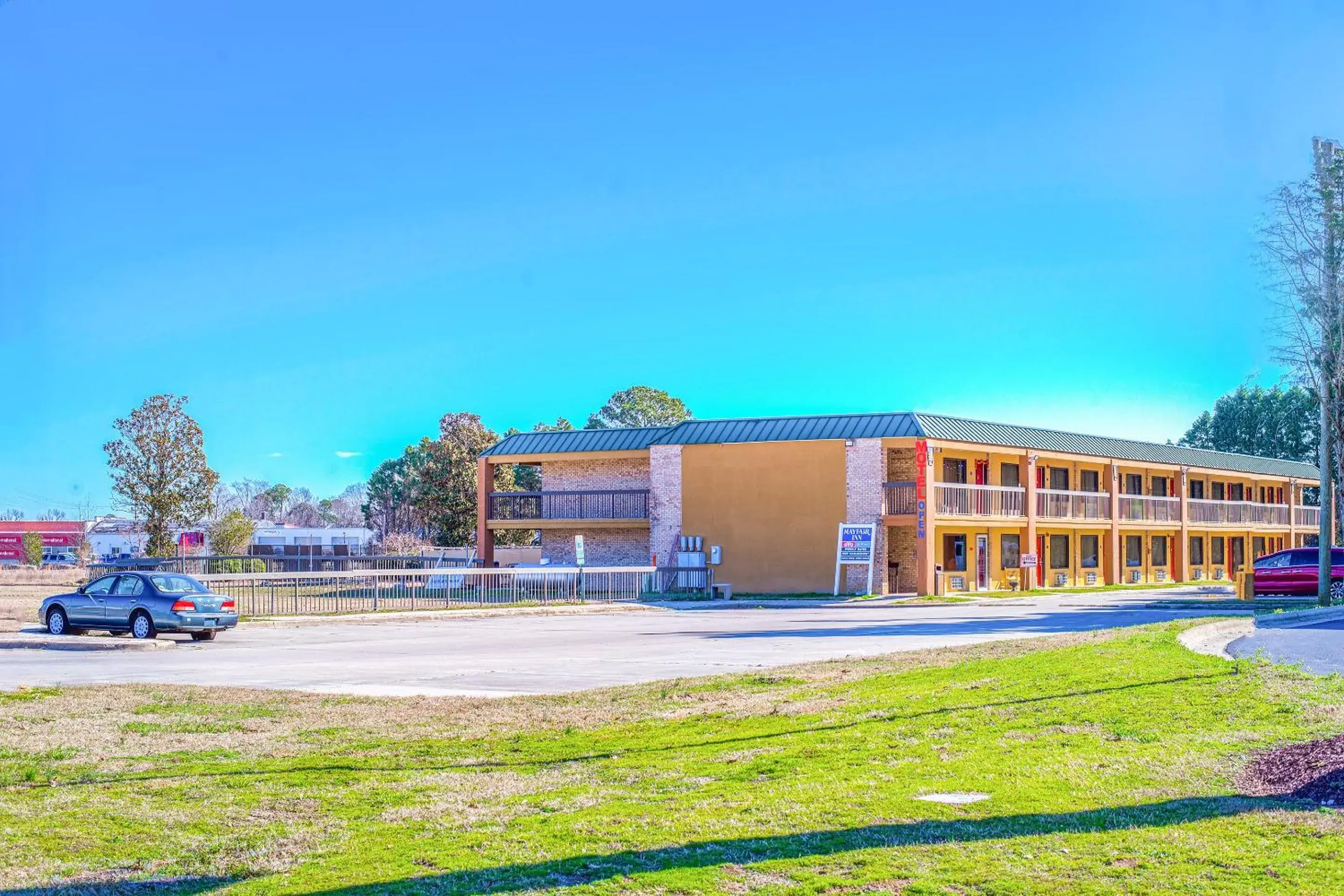 Parking, Property Building in Mayfair Inn by OYO Williamston Hwy 64