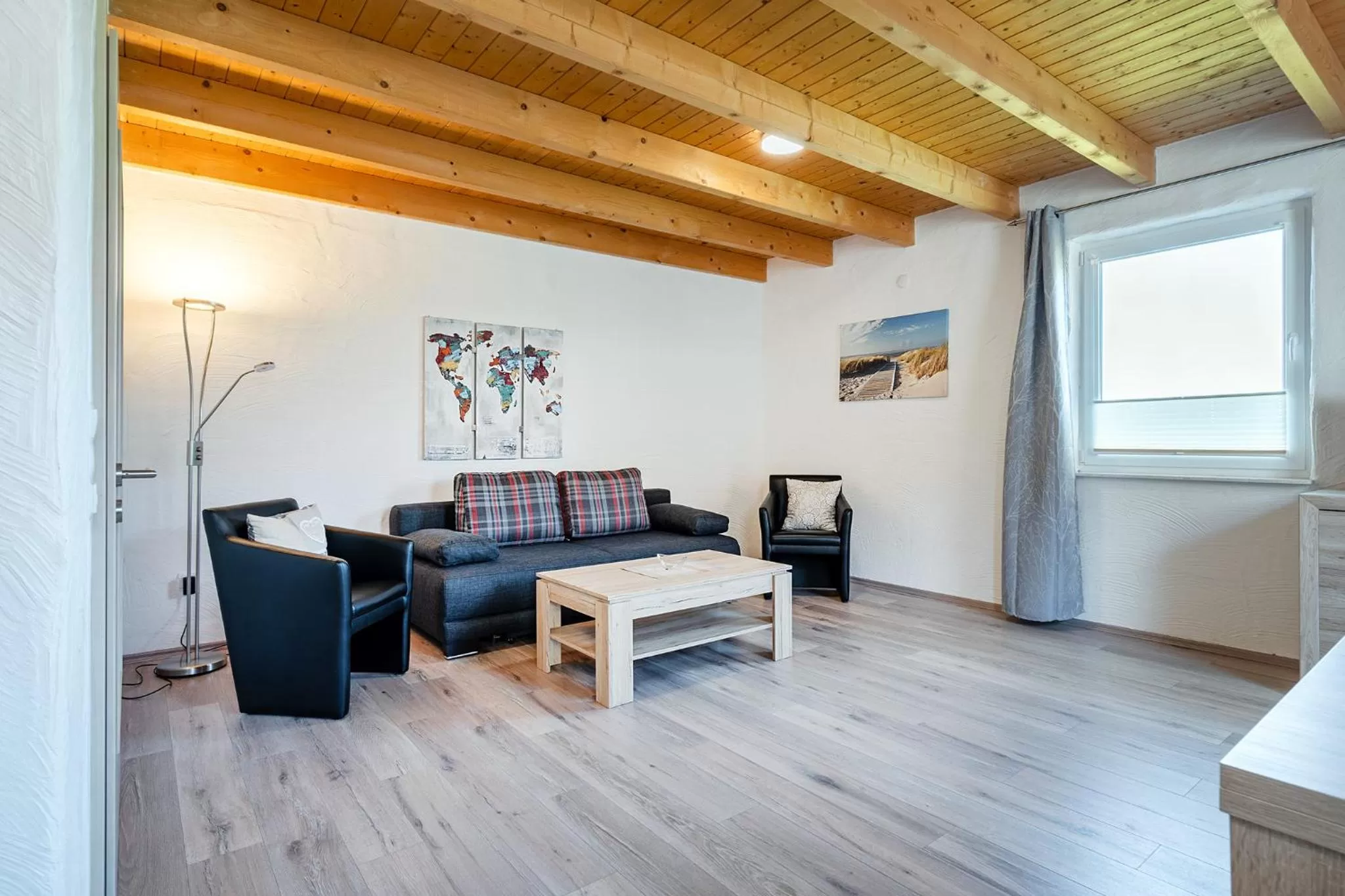 Living room in Villa Moorstern am Badesee Tannenhausen