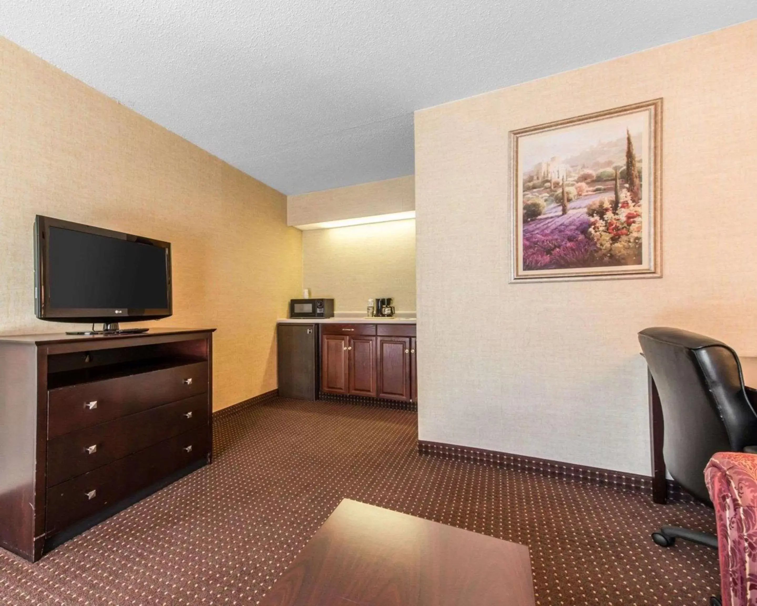 Photo of the whole room, TV/Entertainment Center in Quality Inn & Suites Conference Center Across from Casino