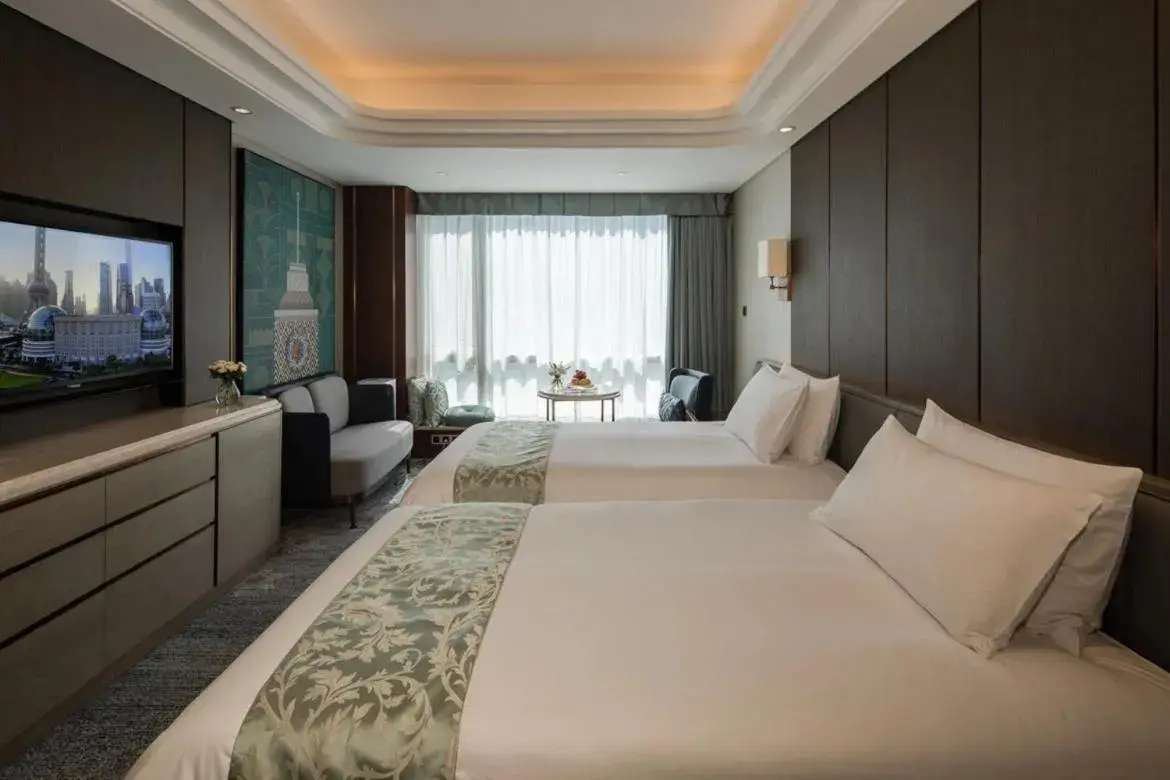 Bed in Oriental Riverside Bund View Hotel (Shanghai International Convention Center)