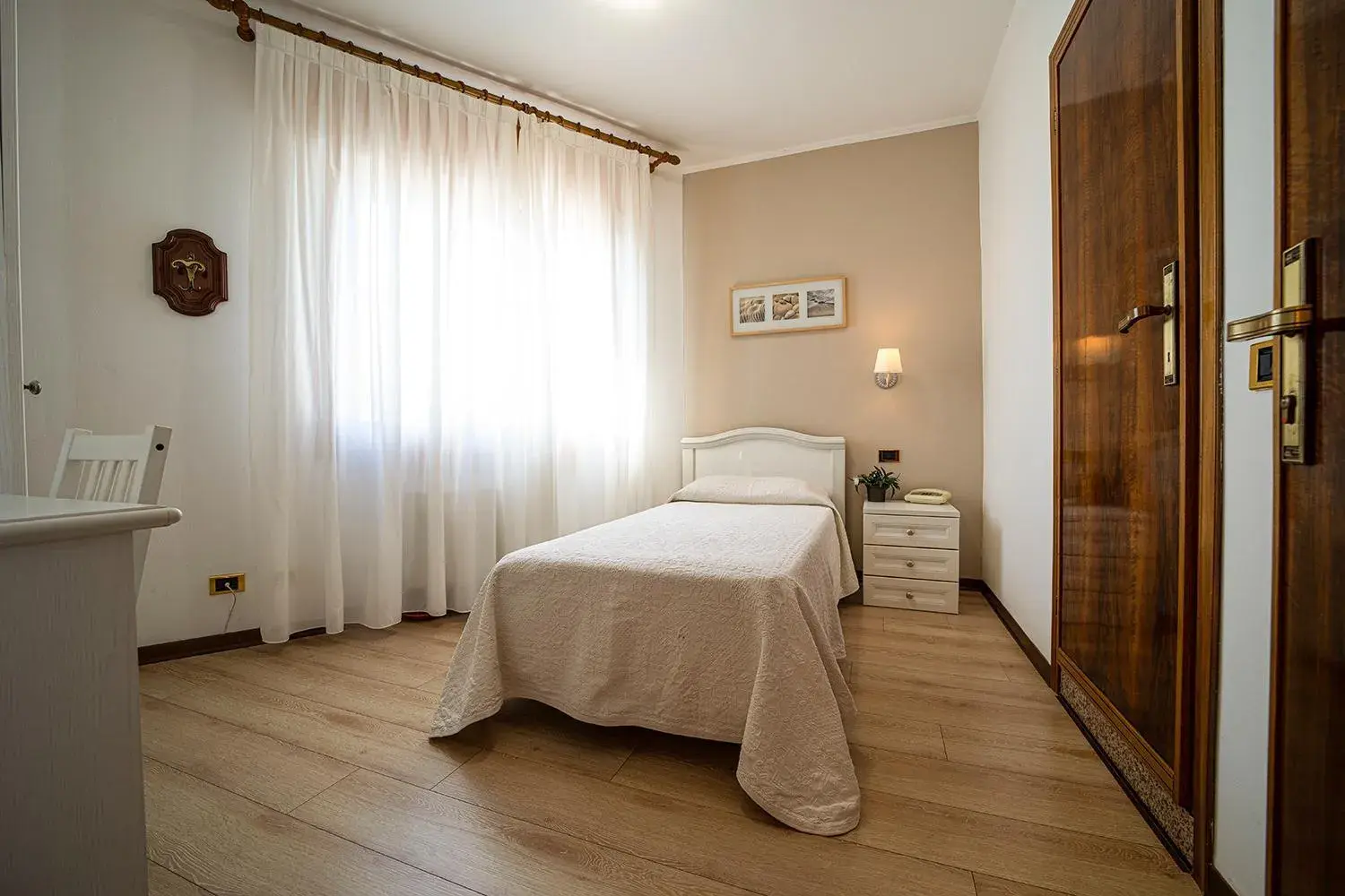 Bed in Albergo Romagnolo