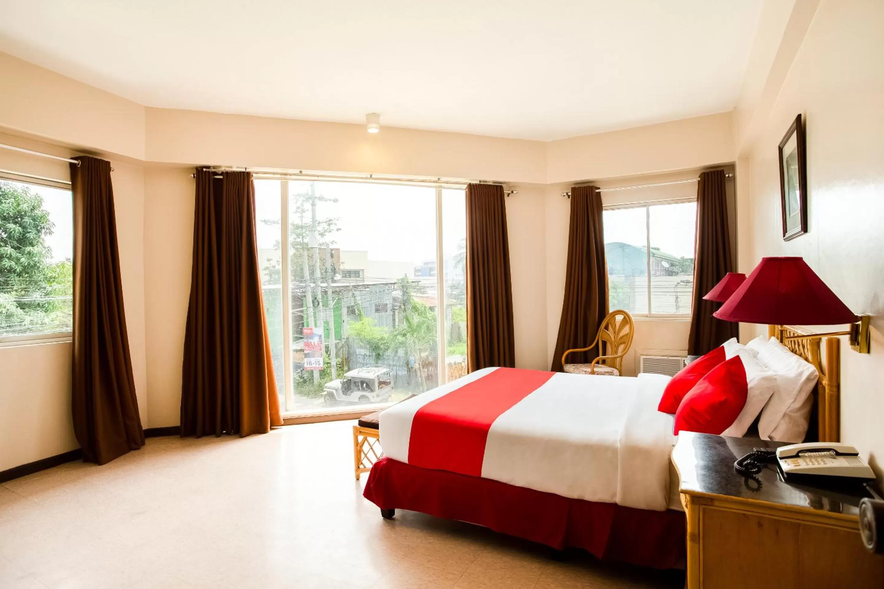 Bedroom in OYO 414 Humberto's Hotel