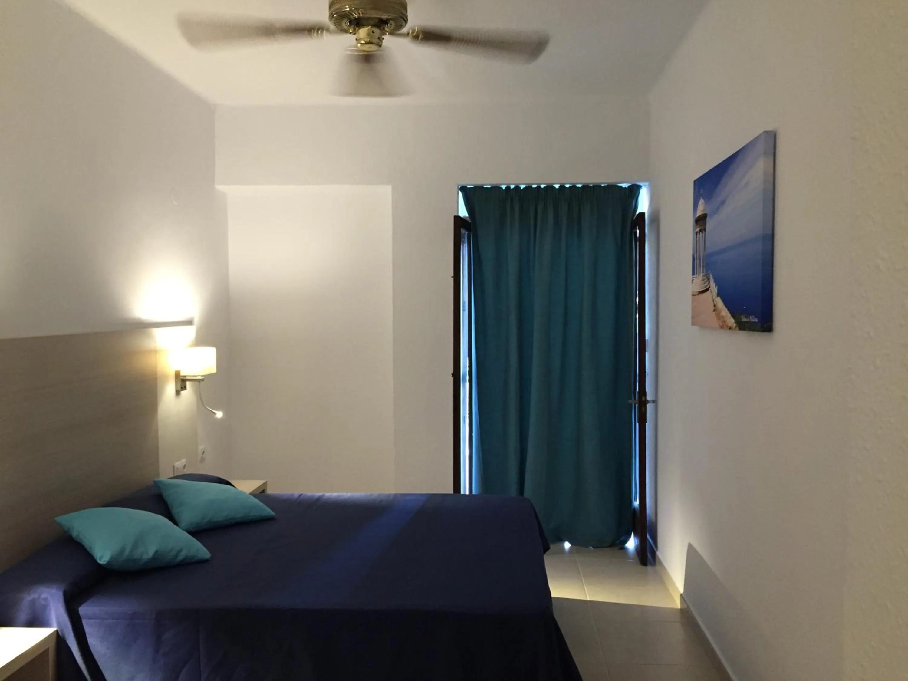 Bed in Hotel Antares