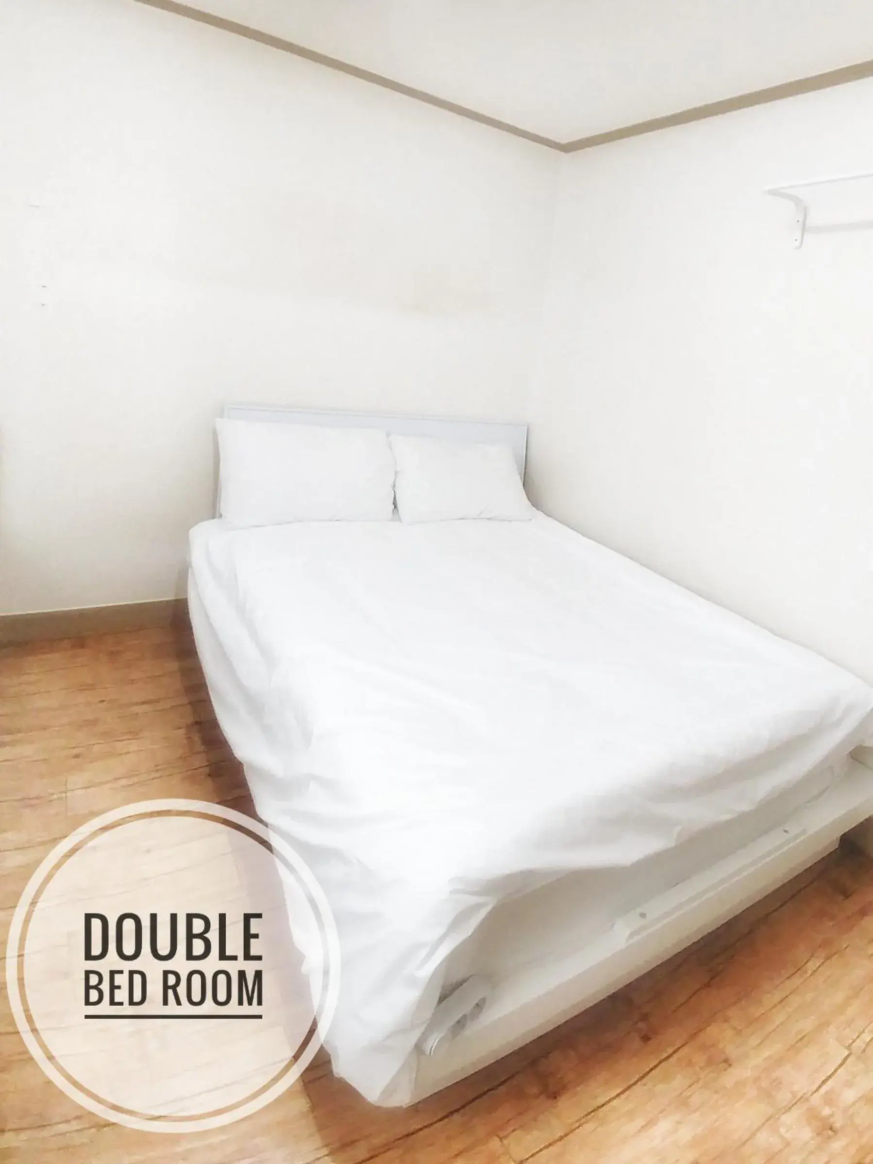 Bed in Masil Guesthouse Jeju