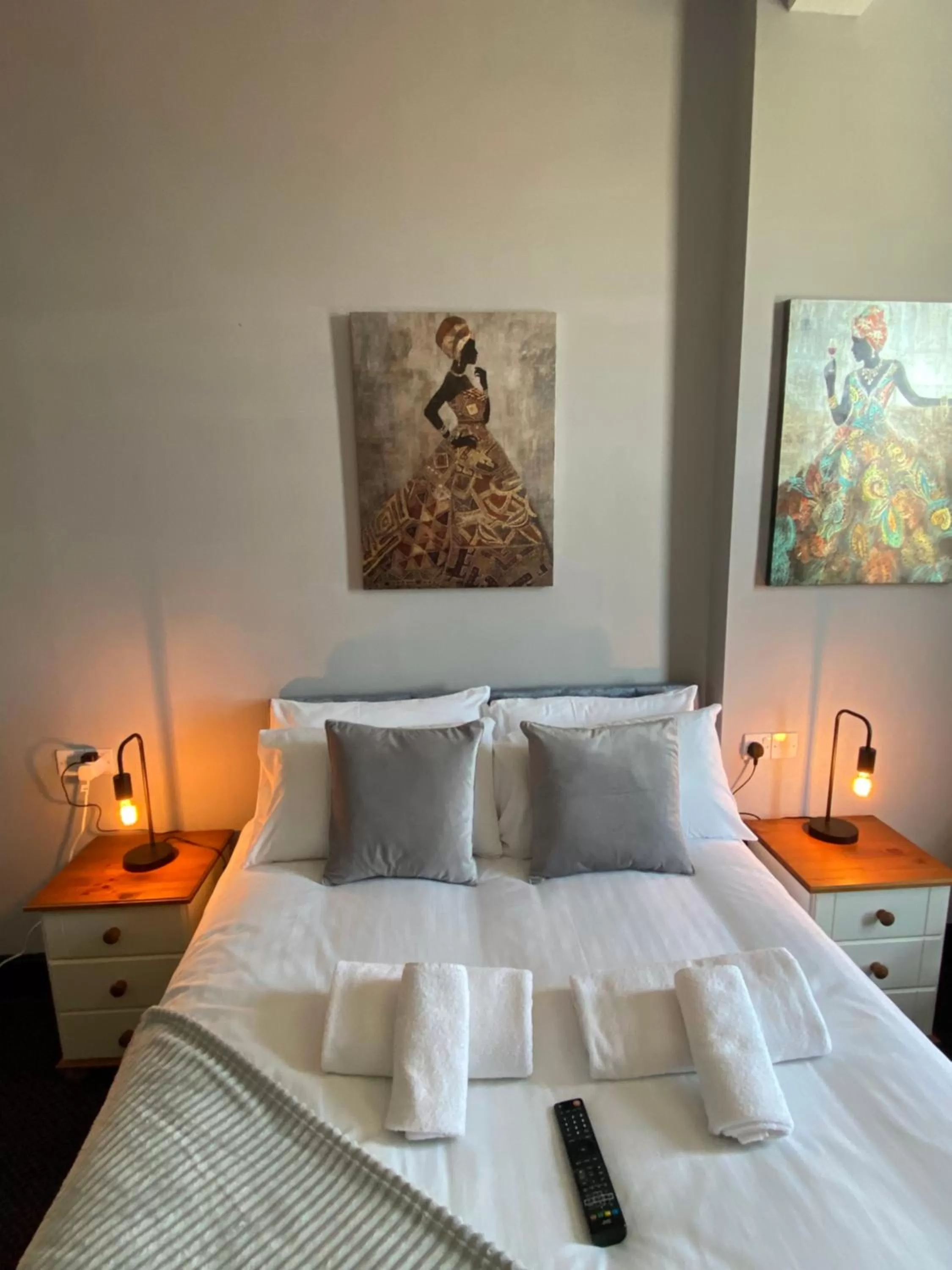 Bed in Bay view rooms at Mentone Hotel