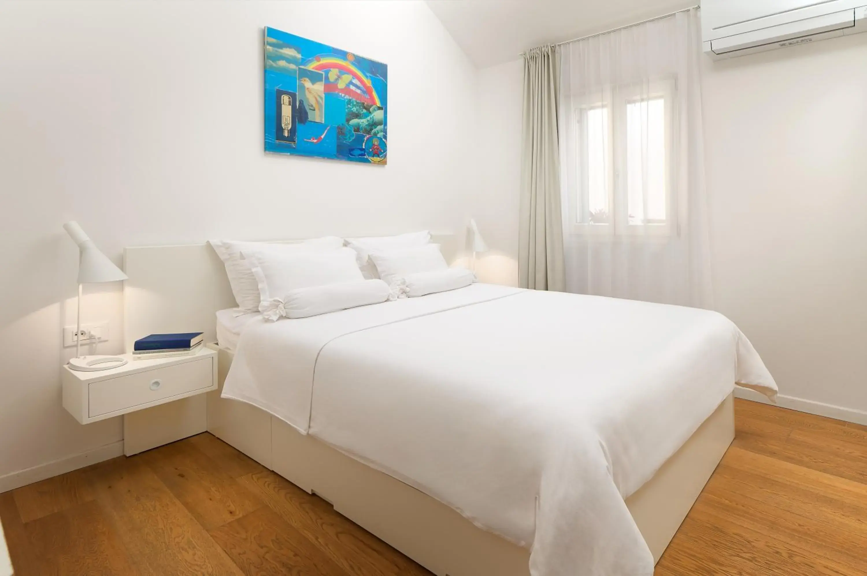 Bed in Divota Apartment Hotel