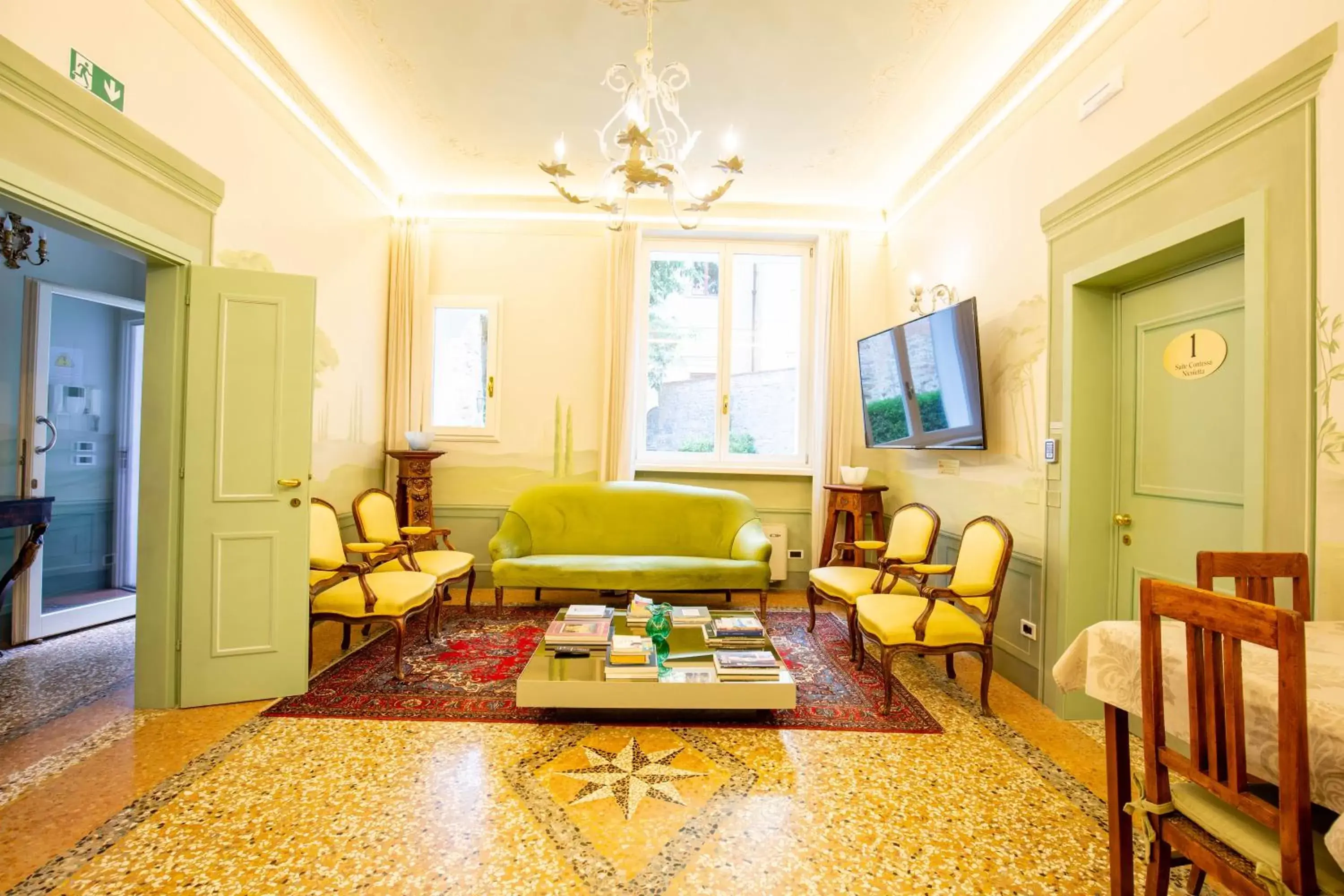 Communal lounge/ TV room, Seating Area in Villa Tortorelli