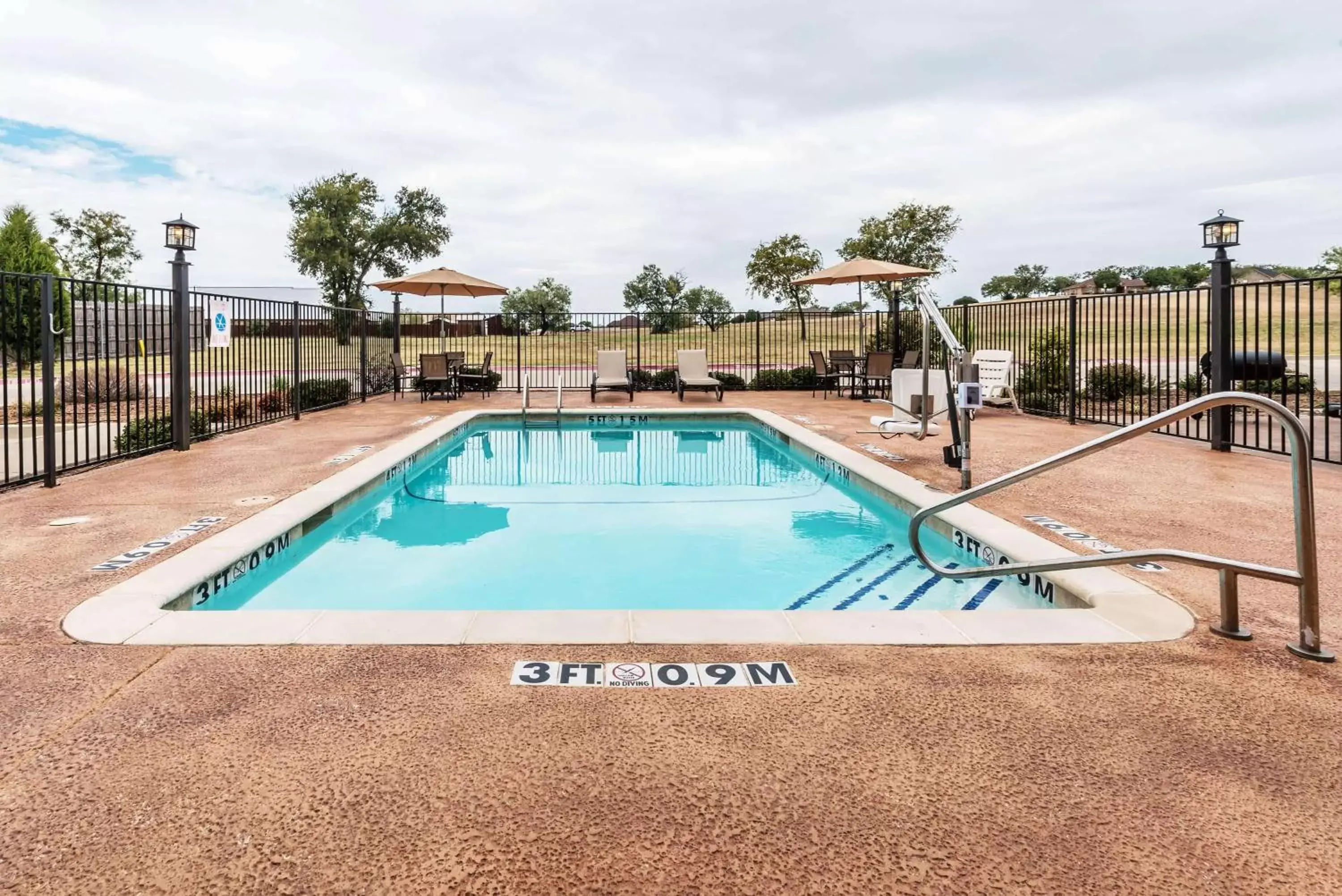 Pool view in Days Inn & Suites by Wyndham Mineral Wells Pool view in Days Inn & Suites by Wyndham Mineral Wells