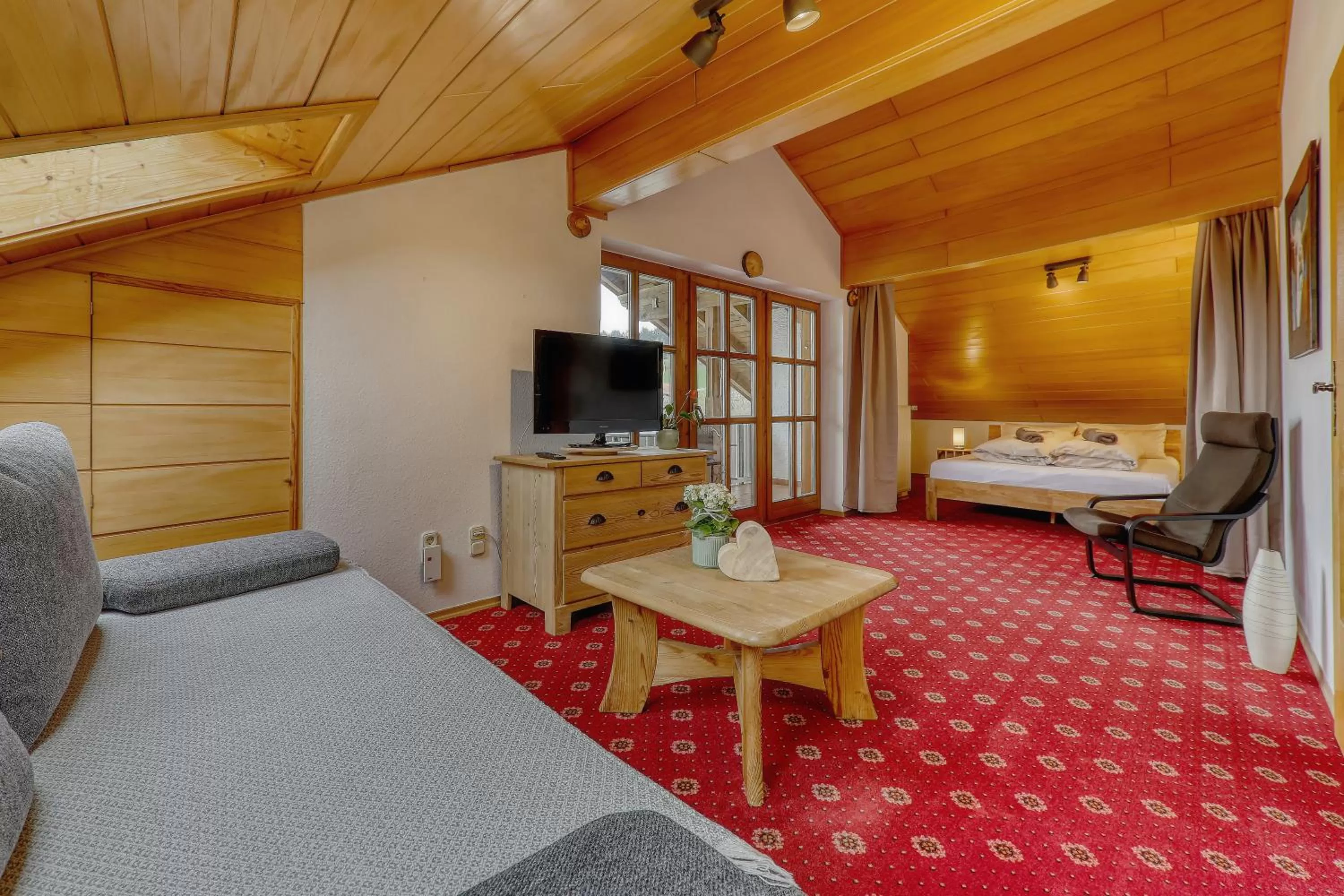 Living room, Bed in Hotel "Haus am Berg"