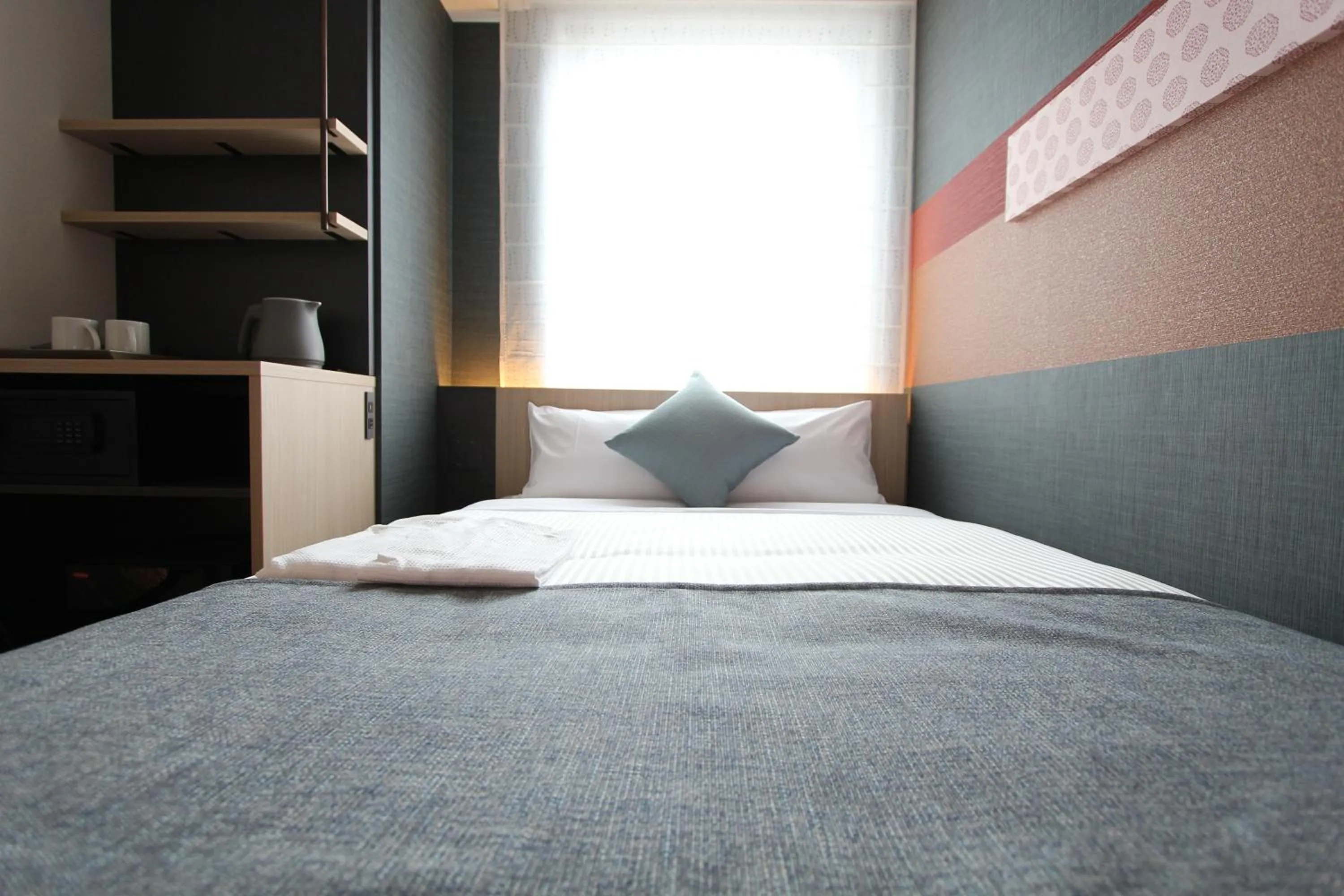 Bed in KOKO HOTEL Tsukiji Ginza