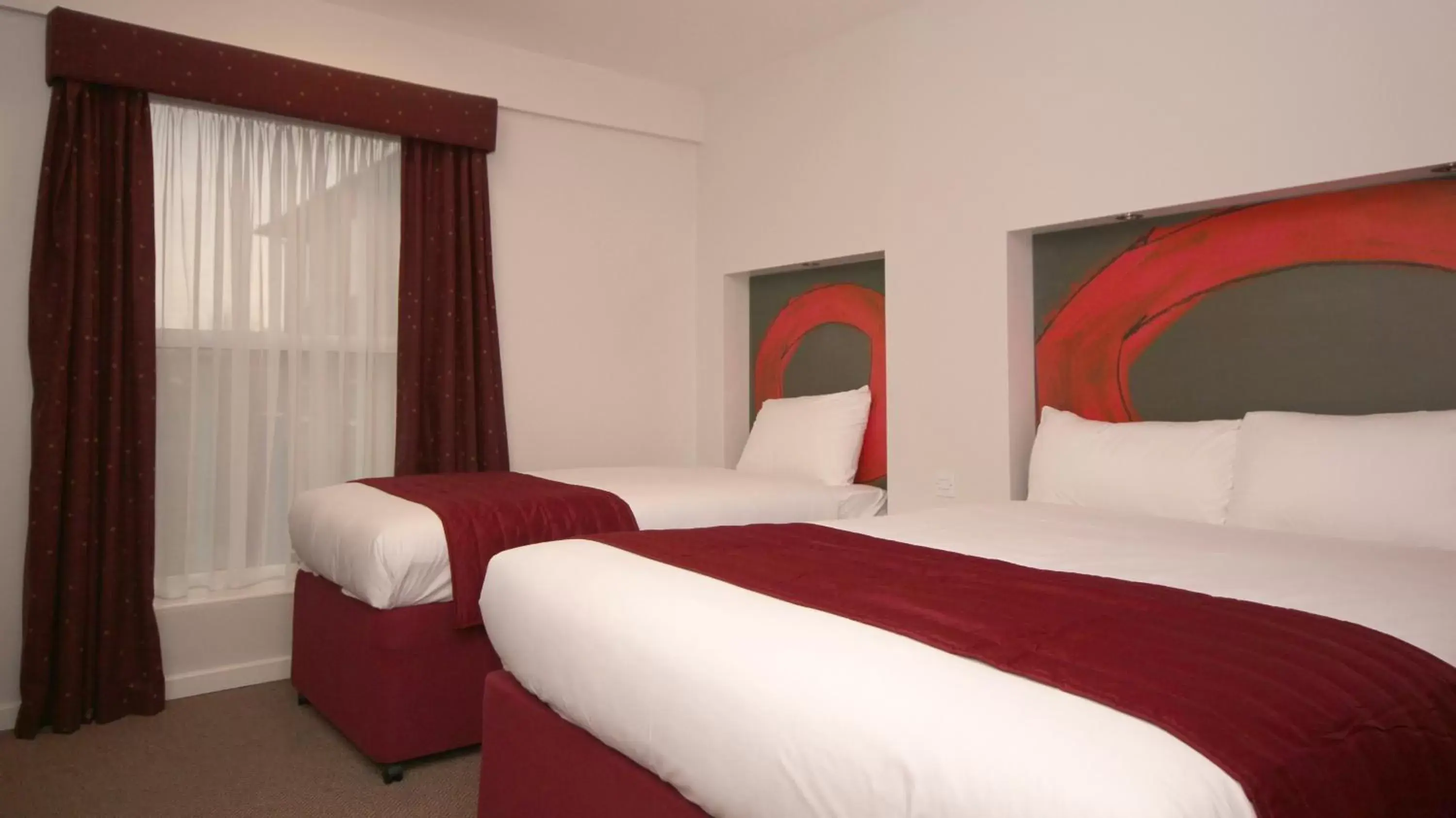 Bed in Ramada London Stansted Airport