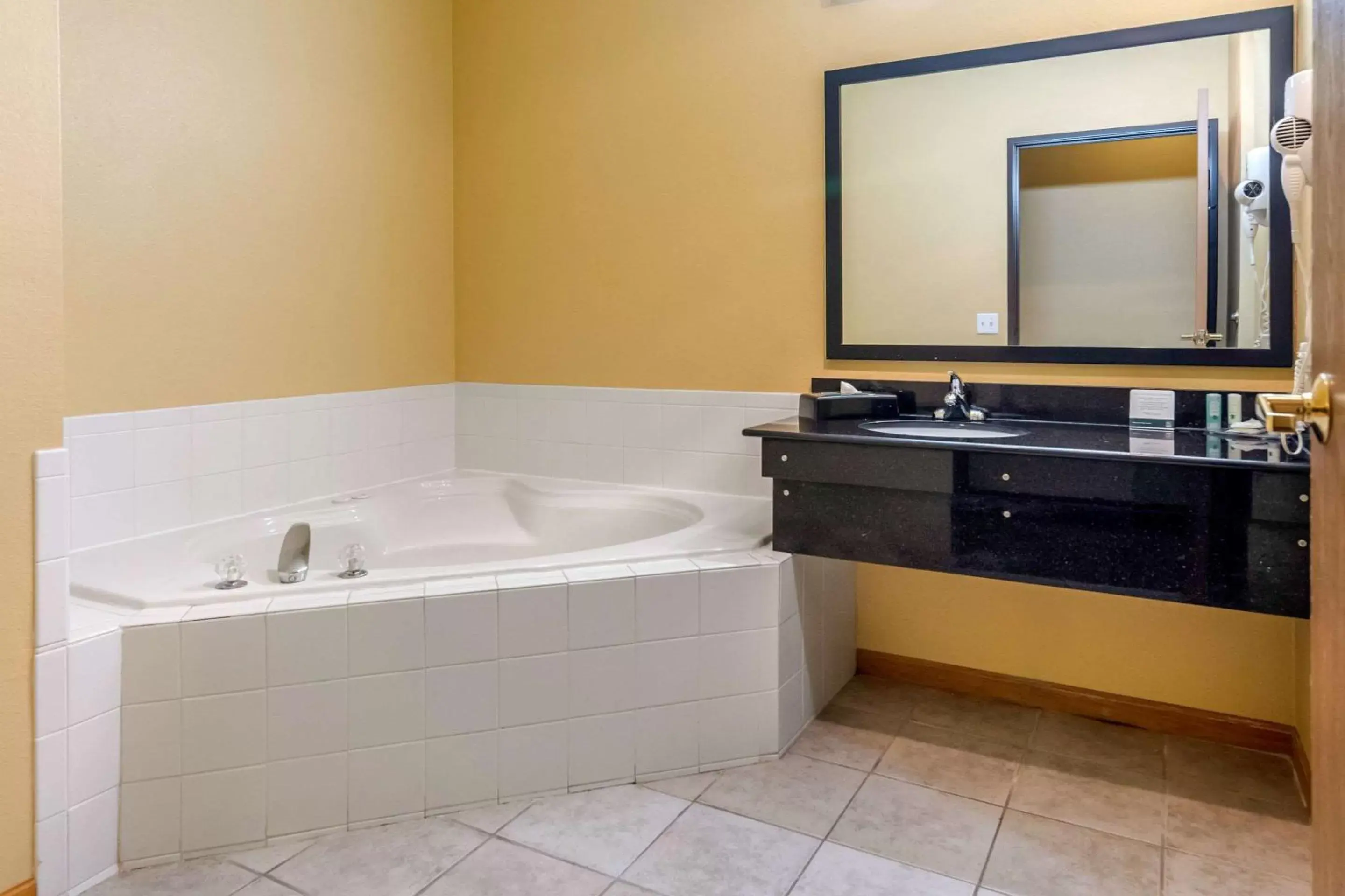 Bathroom in Quality Inn & Suites Lenexa Kansas City