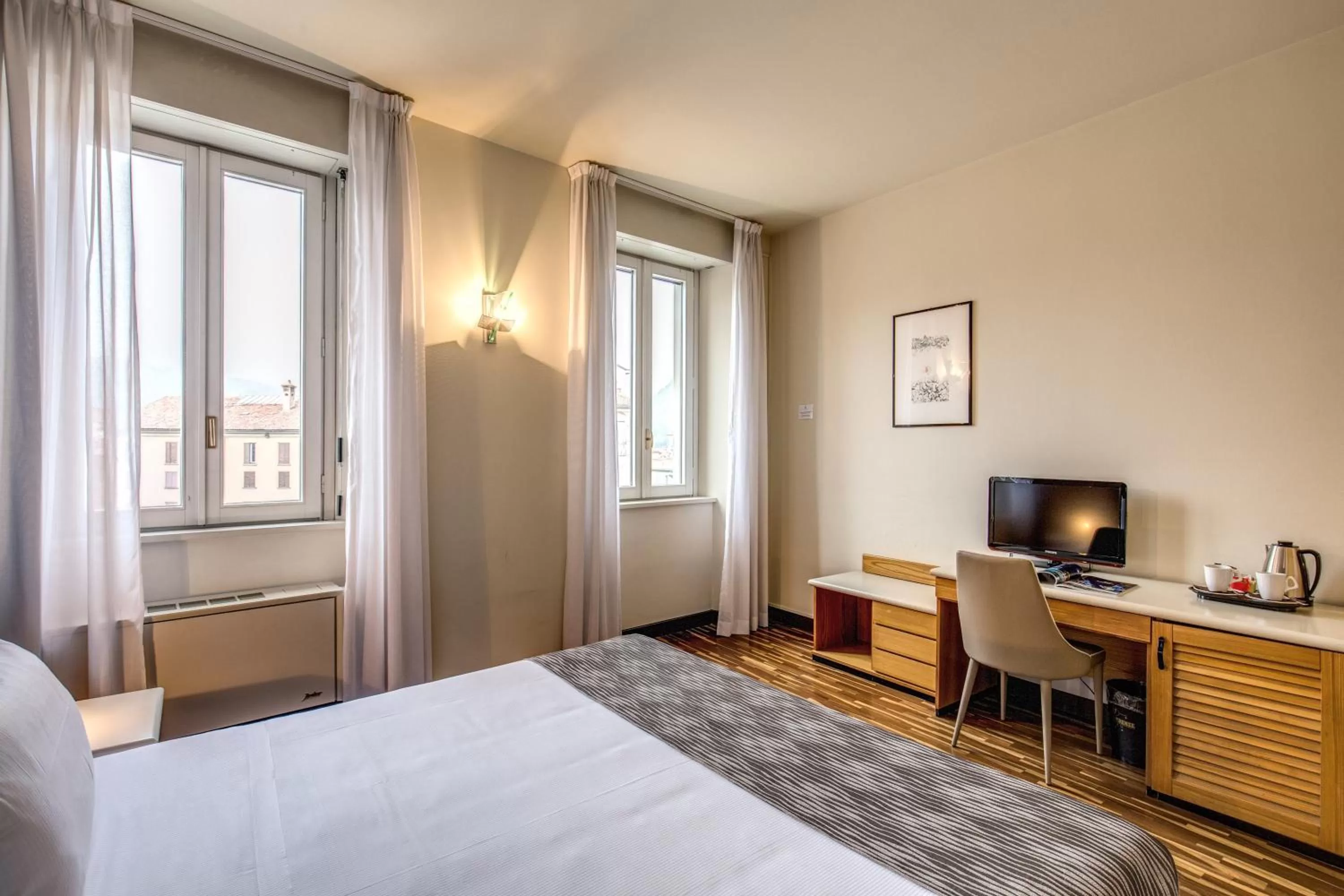 Coffee/tea facilities, Bed in Albergo Firenze