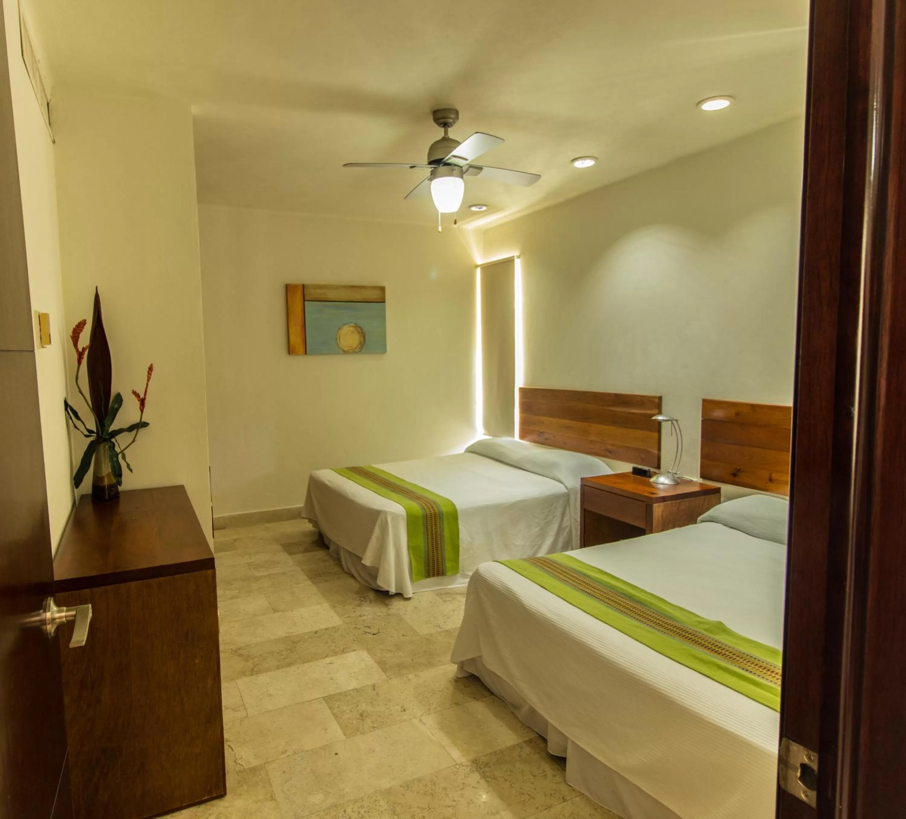 Bedroom in Coral Maya Stay Suites