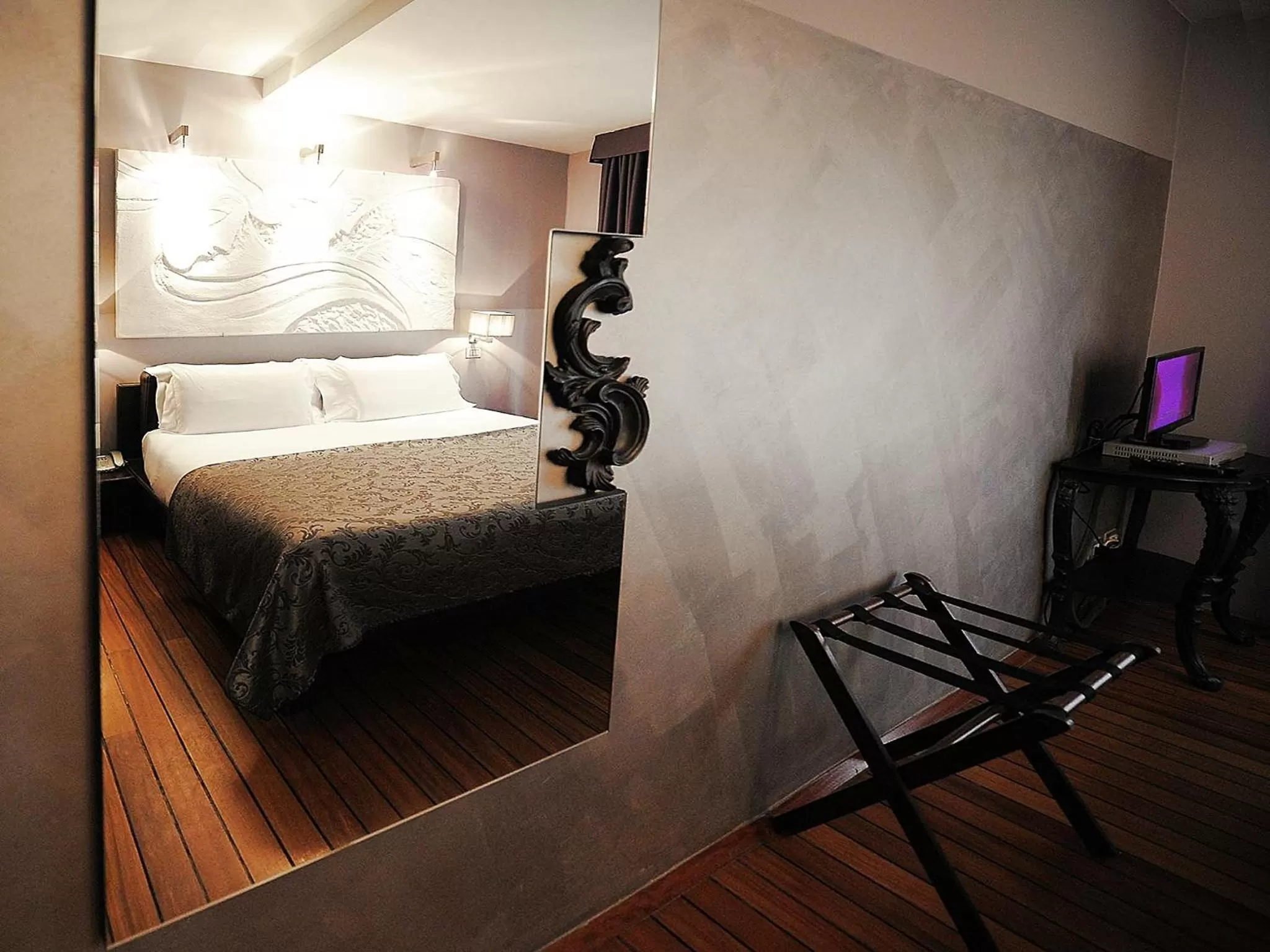 Decorative detail, Bed in Borghese Palace Art Hotel