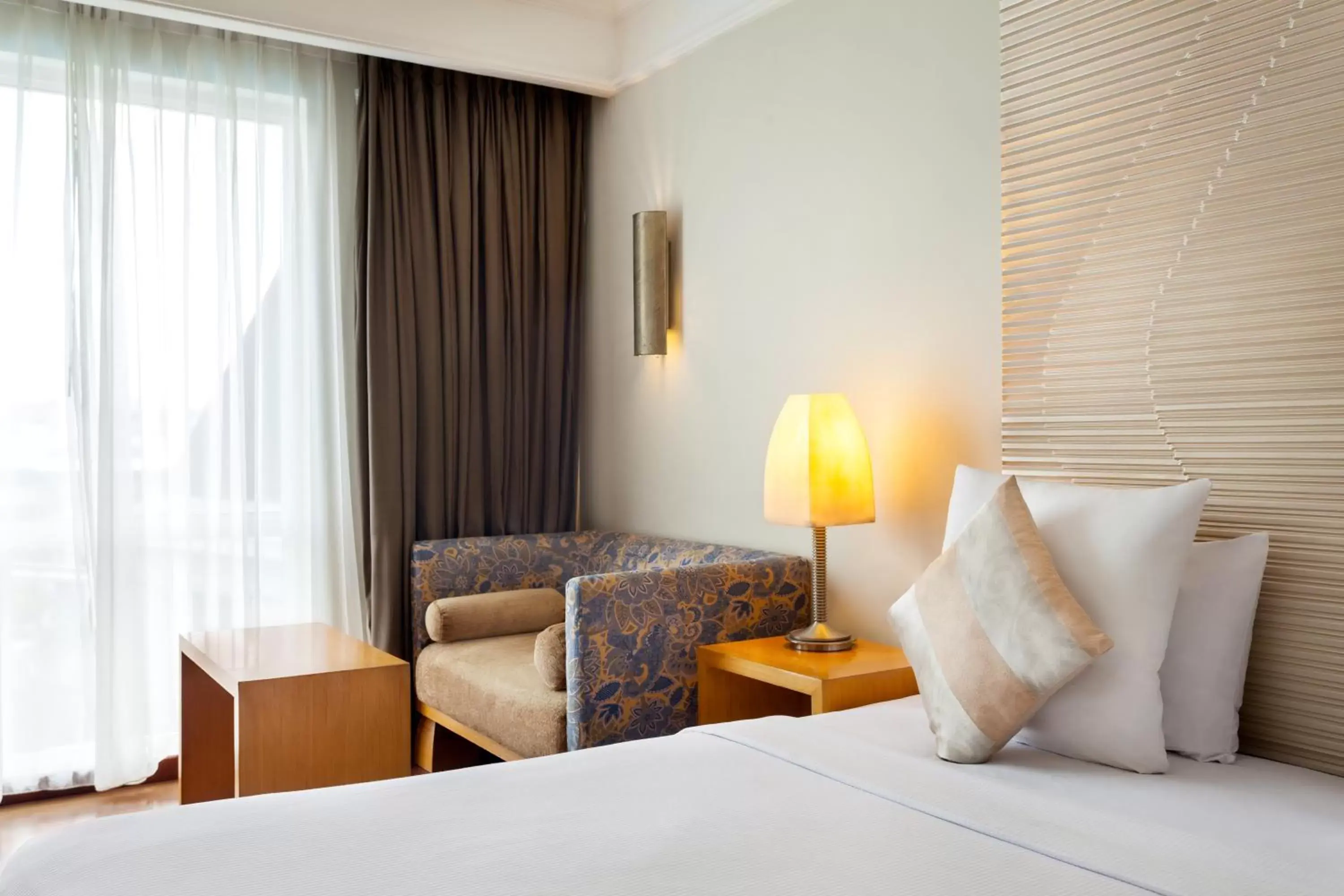 Bed in Novotel Semarang - GeNose Ready, CHSE Certified