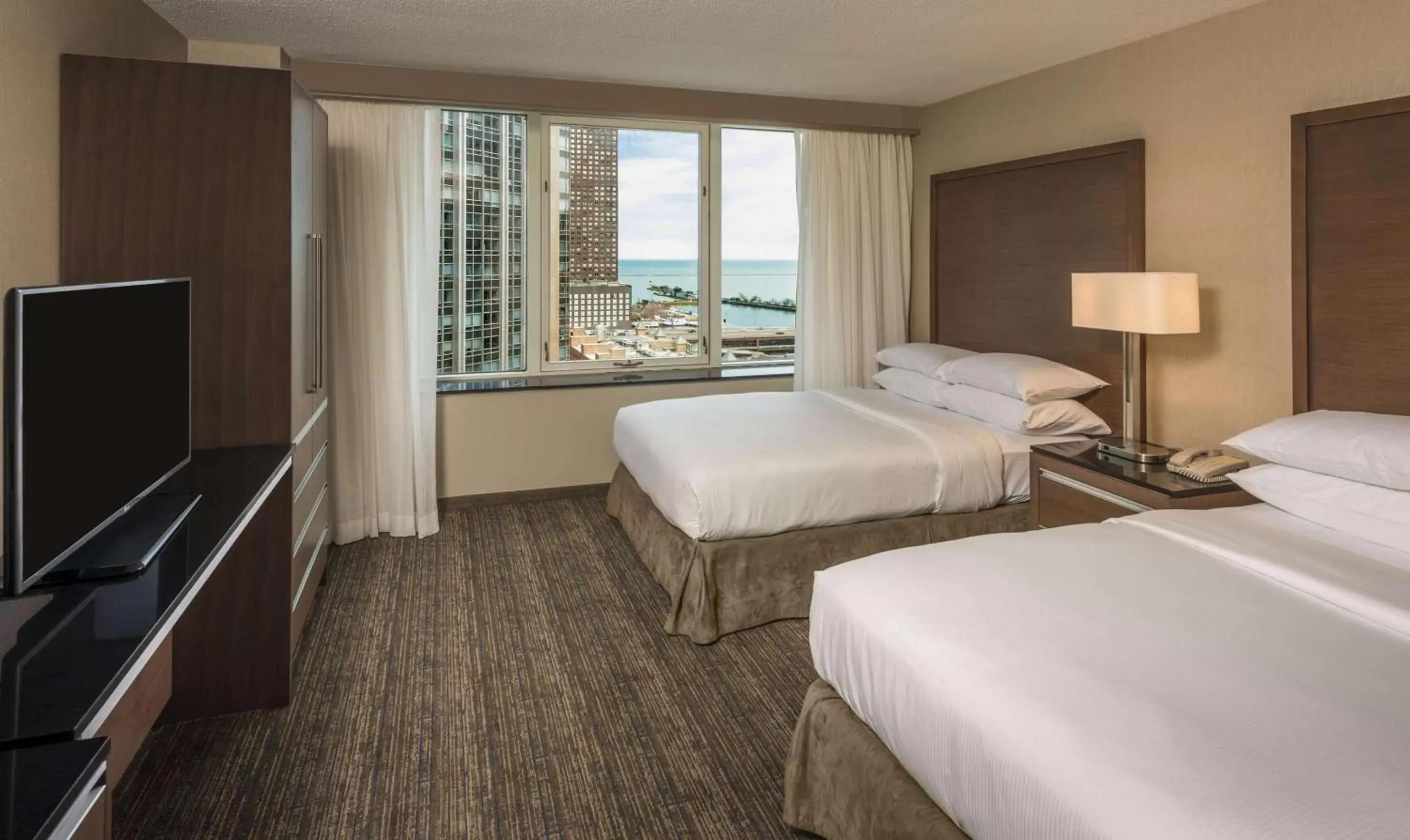 Bed in Embassy Suites by Hilton Chicago Downtown Magnificent Mile