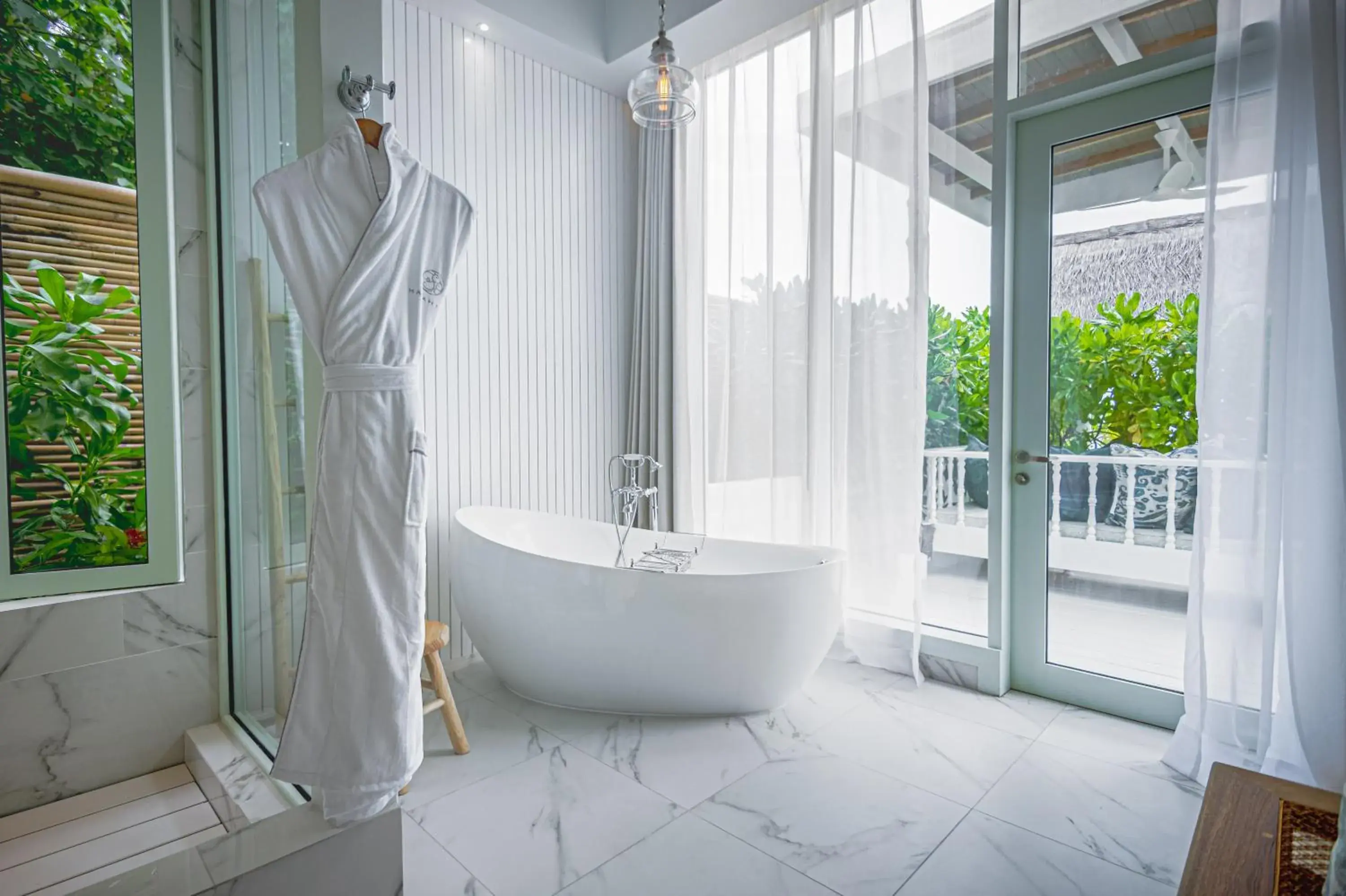 Bathroom in Malahini Kuda Bandos Resort