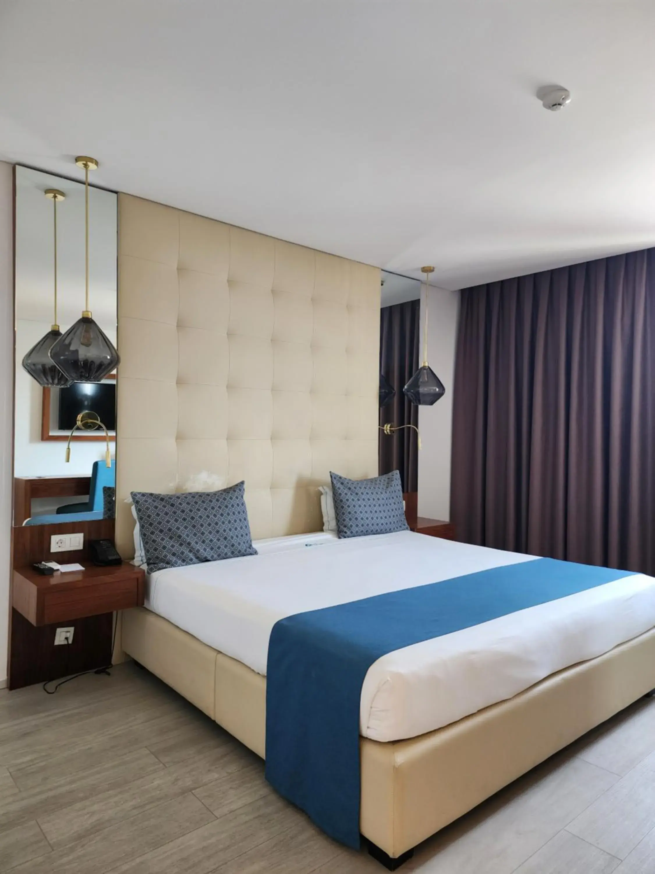 Bed in Afrin Prestige Hotel