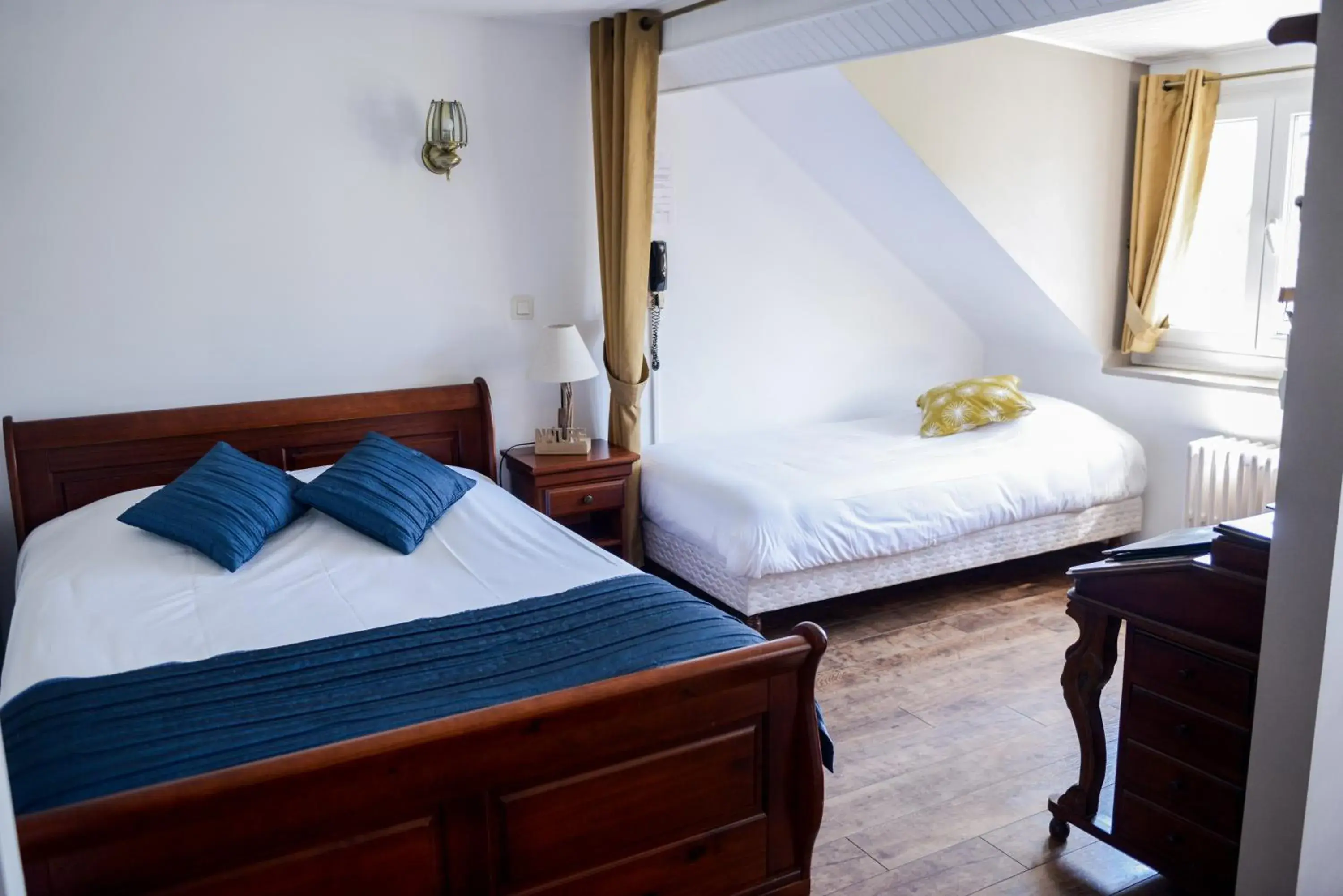 Bed in Hotel Saint Hubert