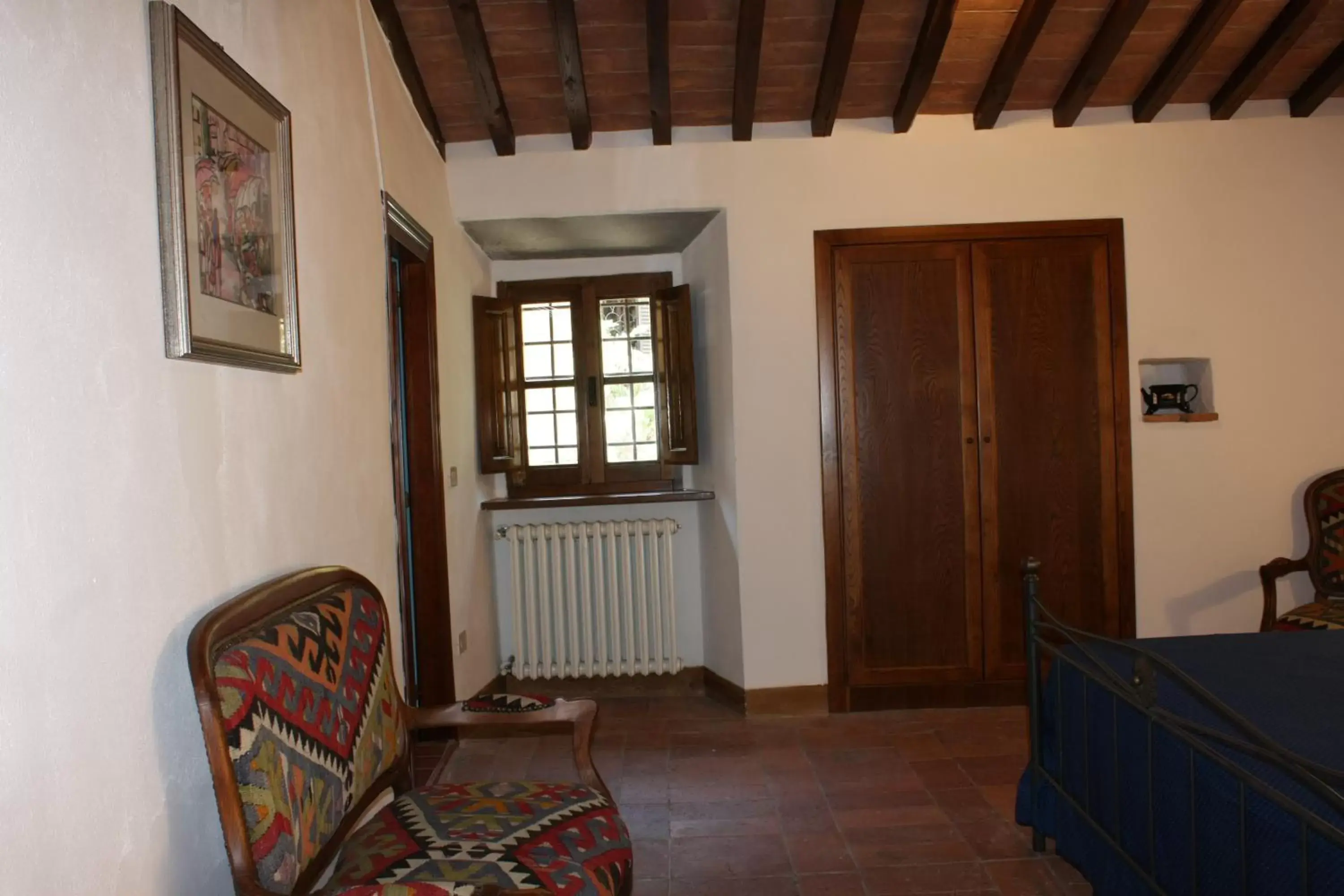 Bed, Seating Area in Villa La Nussa