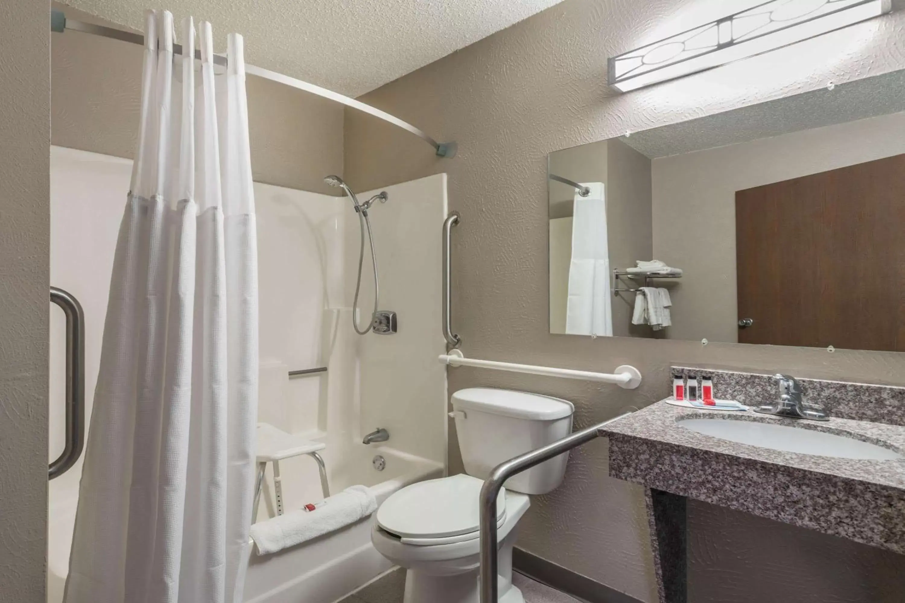 Bathroom in Super 8 by Wyndham Gillette